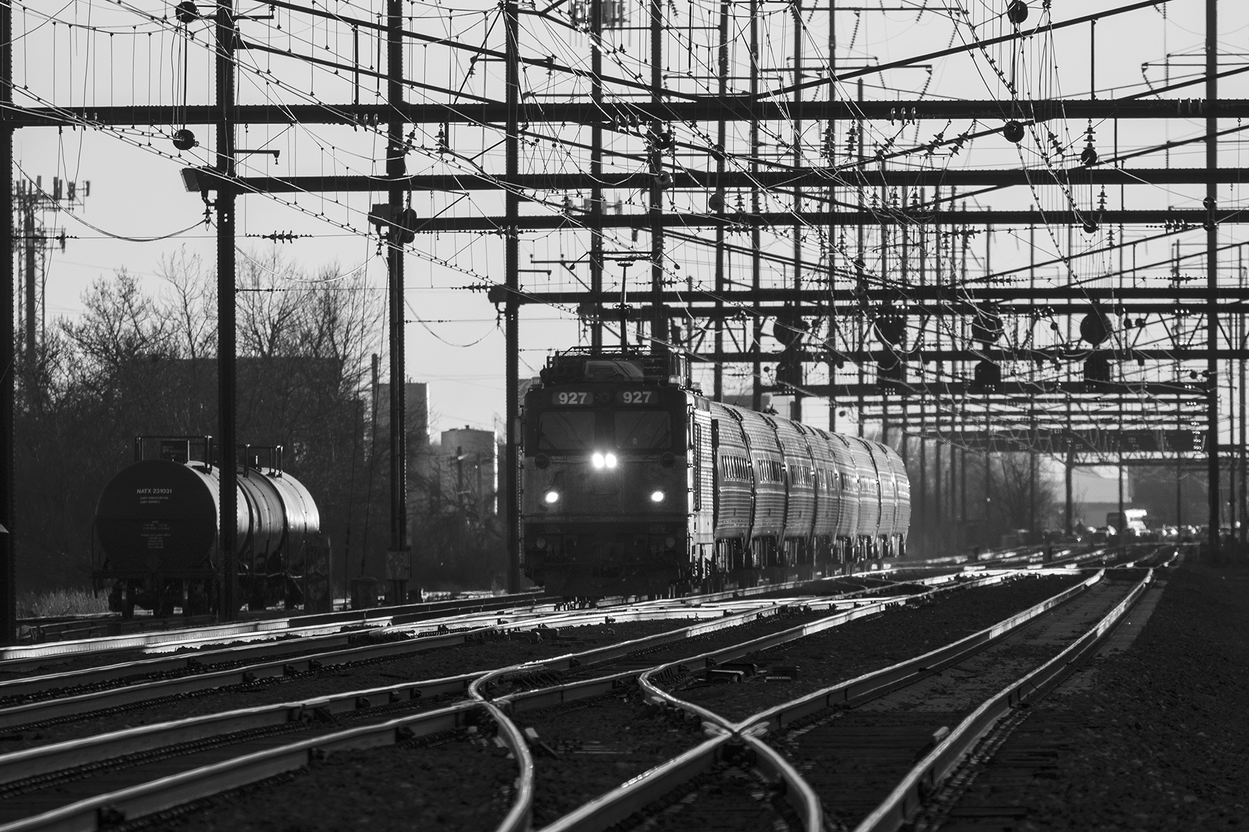 One of the last remaining Amtrak AEM-7s heads north with a regional train through Holmesburg Junction in Northeast Philadelphia shortly before retirement in February of 2016. Photograph by Patrick Yough