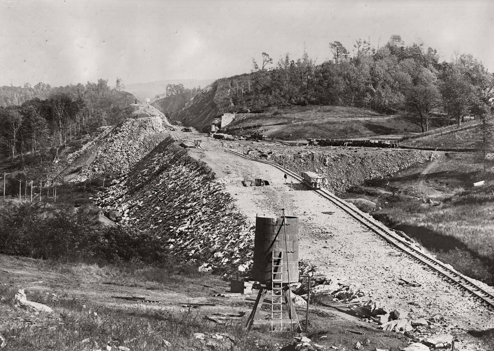 One of seven cuts and a fill illustrated in this Manor Township view in Southern Lancaster County. Chief Engineer, William, H Brown, saw to it that the ablest contractors were employed to complete this challenging work promptly. The Manor section was contracted to Patricius McManus a very accomplished railroad builder and neighbor of Brown. Harry P. Stoner photograph, Kline Collection, Railroad Museum of Pennsylvania, PHMC