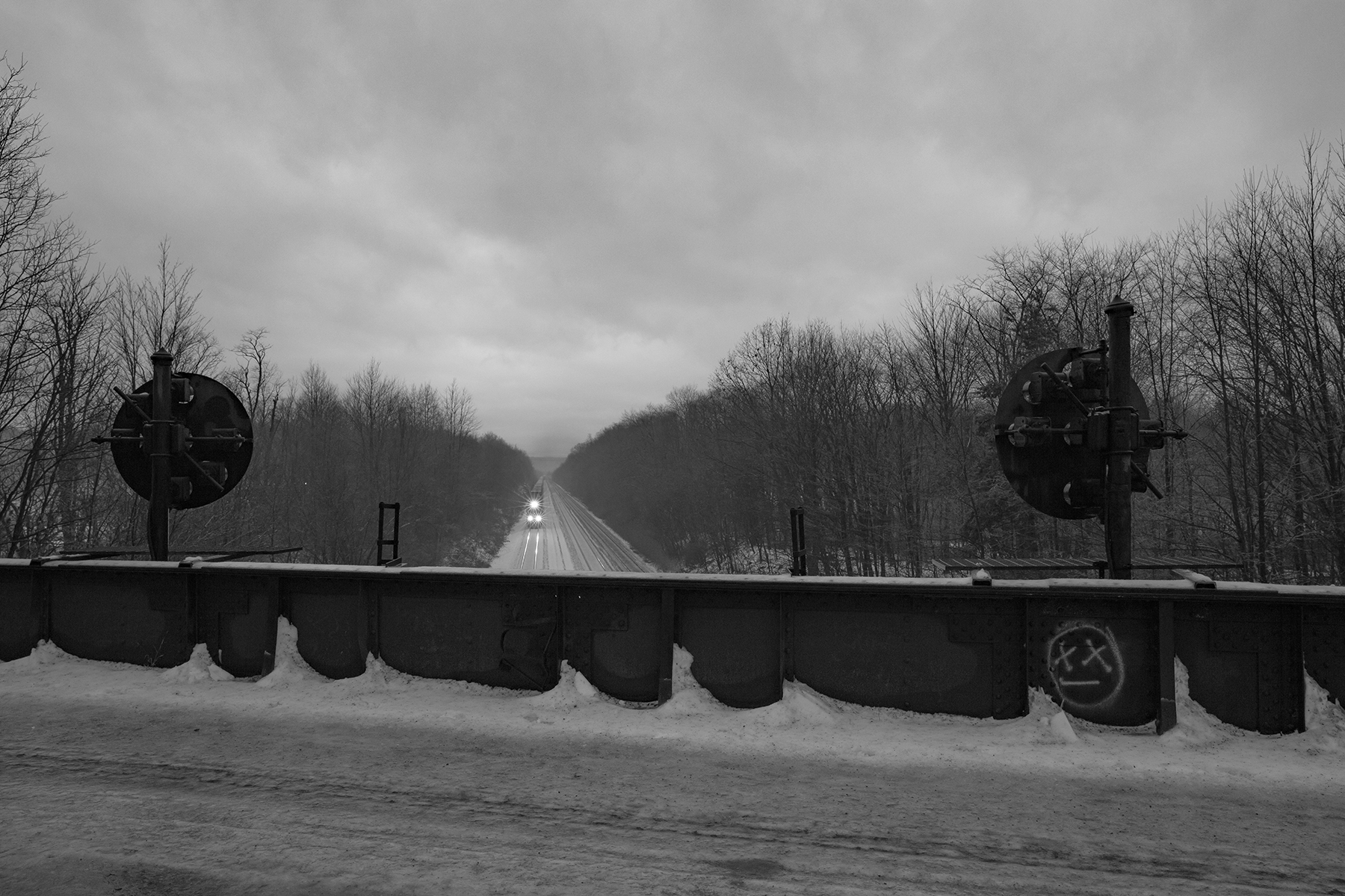 One train in an endless parade of eastbound traffic works its way slowly up the West Slope on the former Pennsylvania Railroad main line in Portage, Pennsylvania