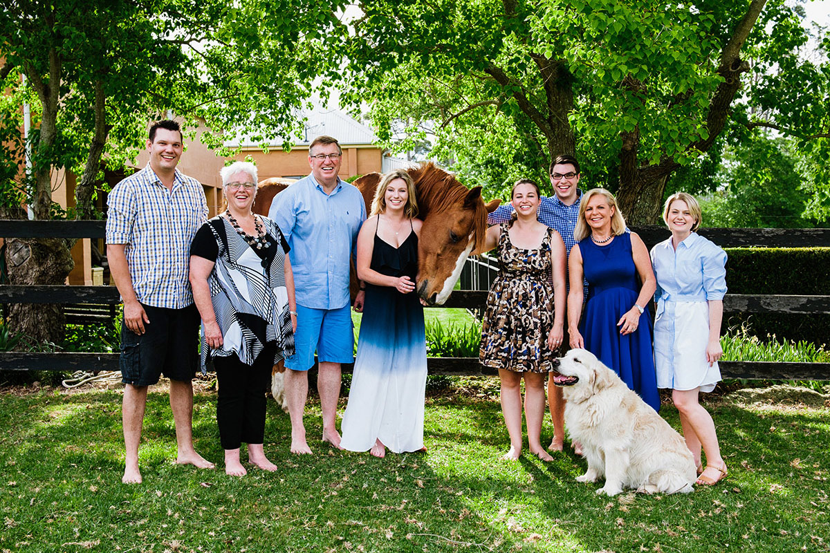 Large family group with animals