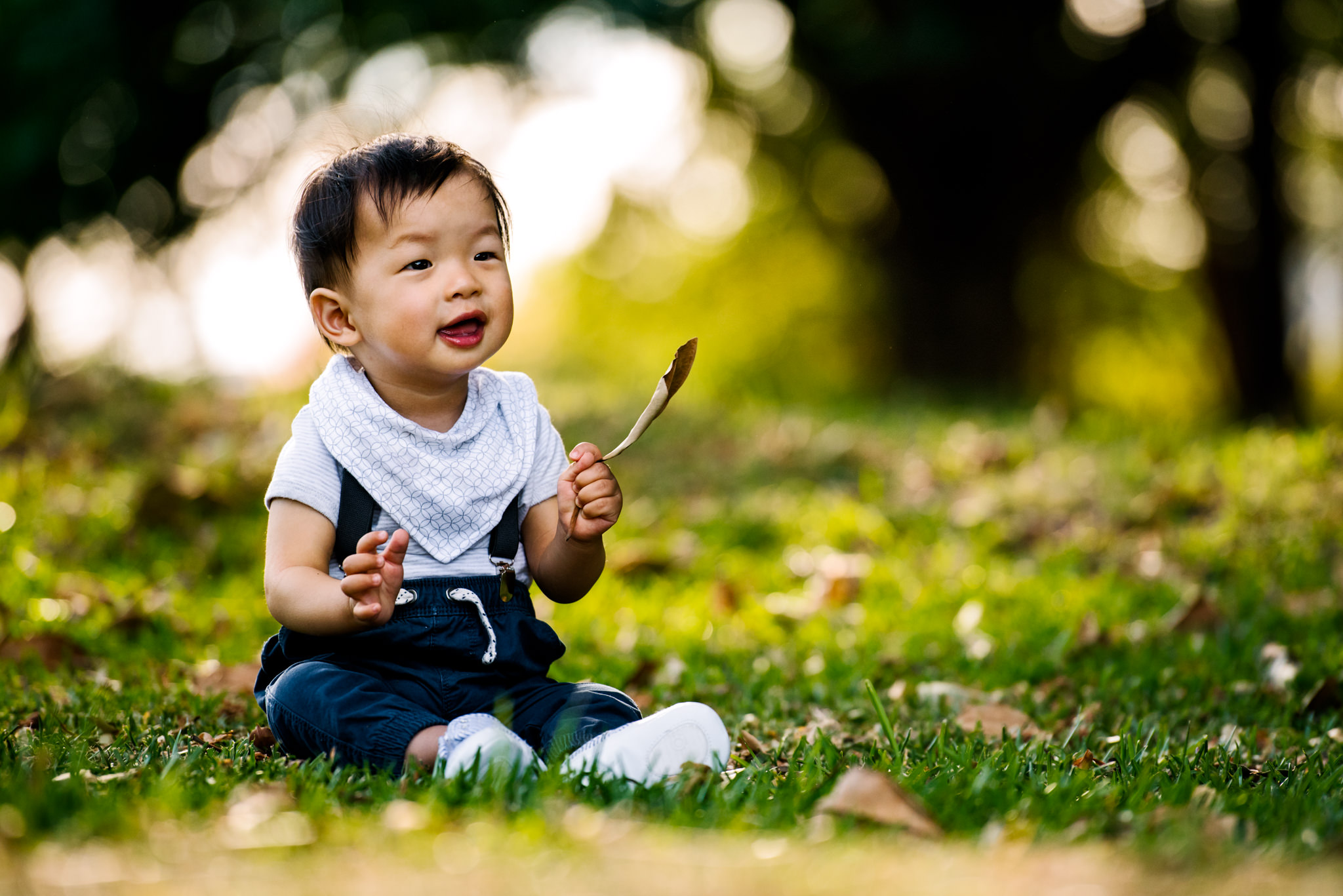 Cute baby smiling in park