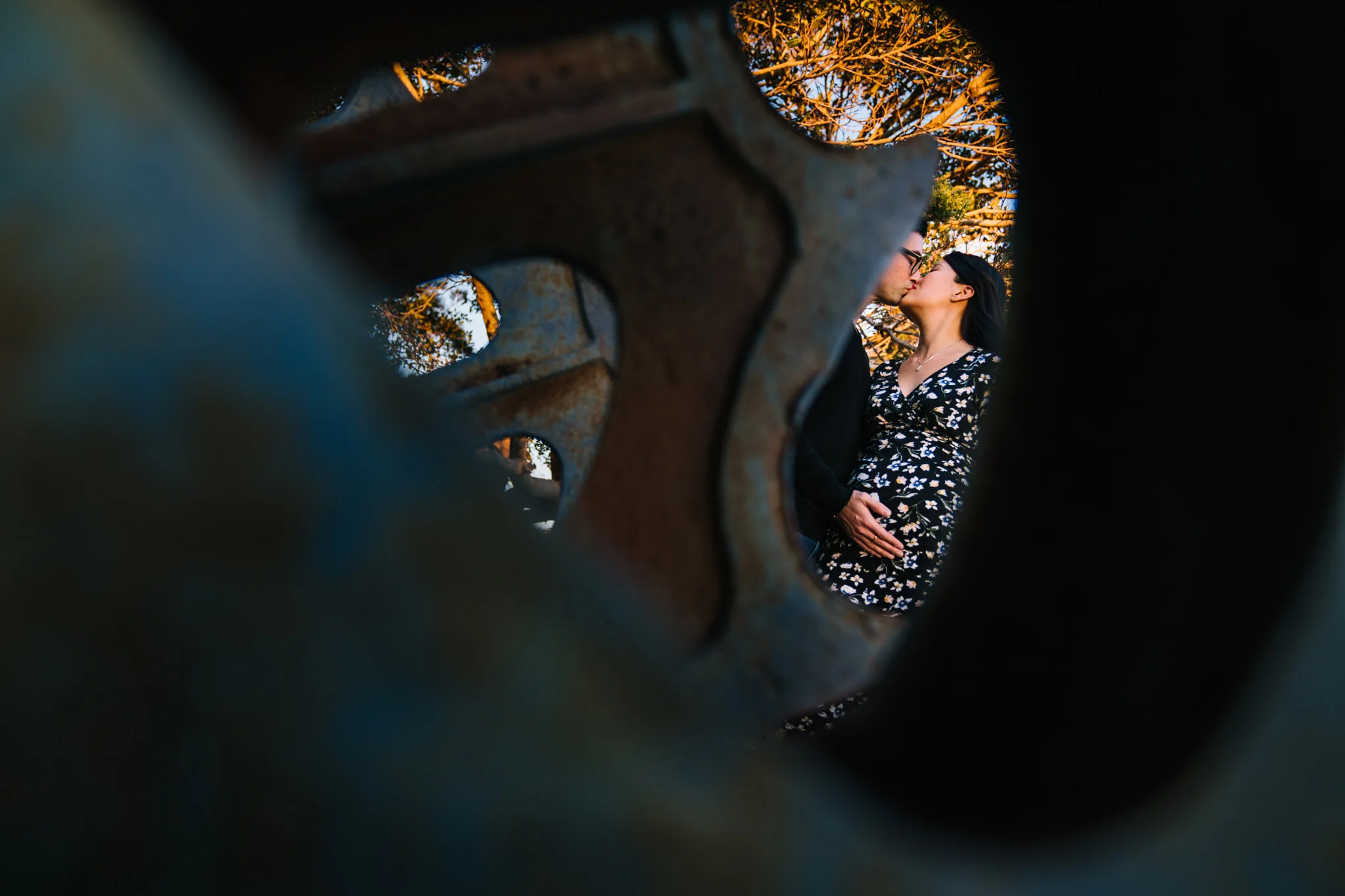 Pregnant couple kissing during Sydney maternity session