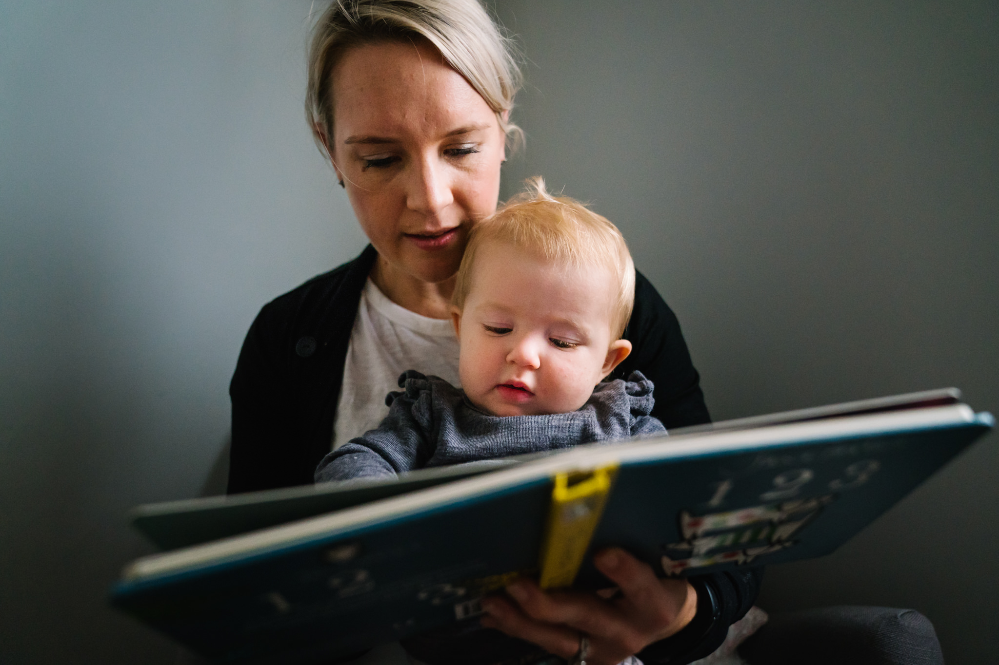 Baby and mum reading
