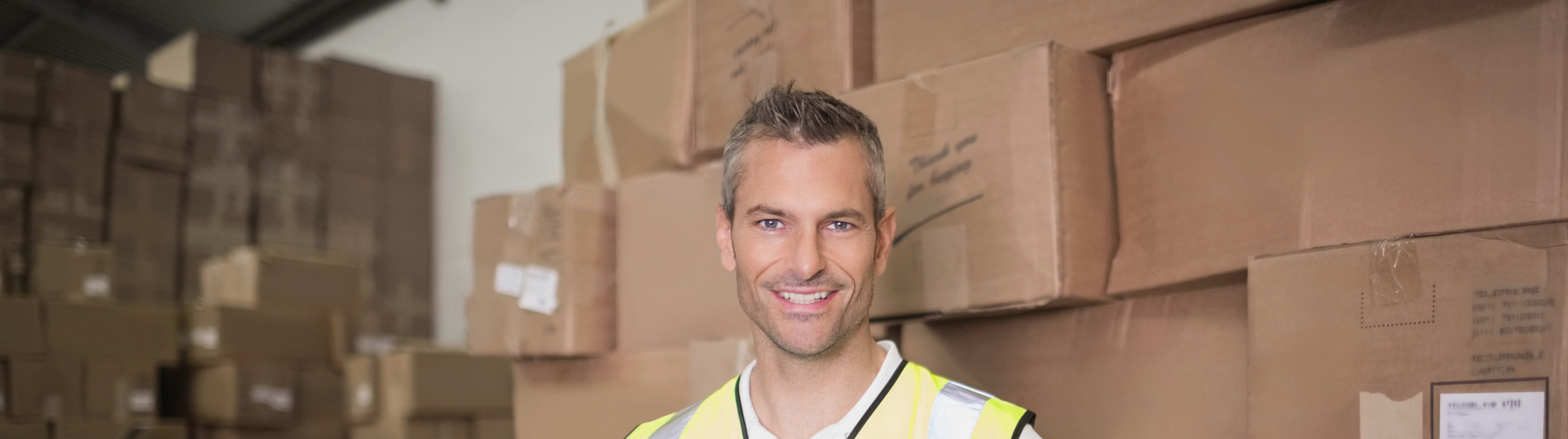photodune-12404961-manual-worker-scanning-package-in-the-warehouse-l.jpg