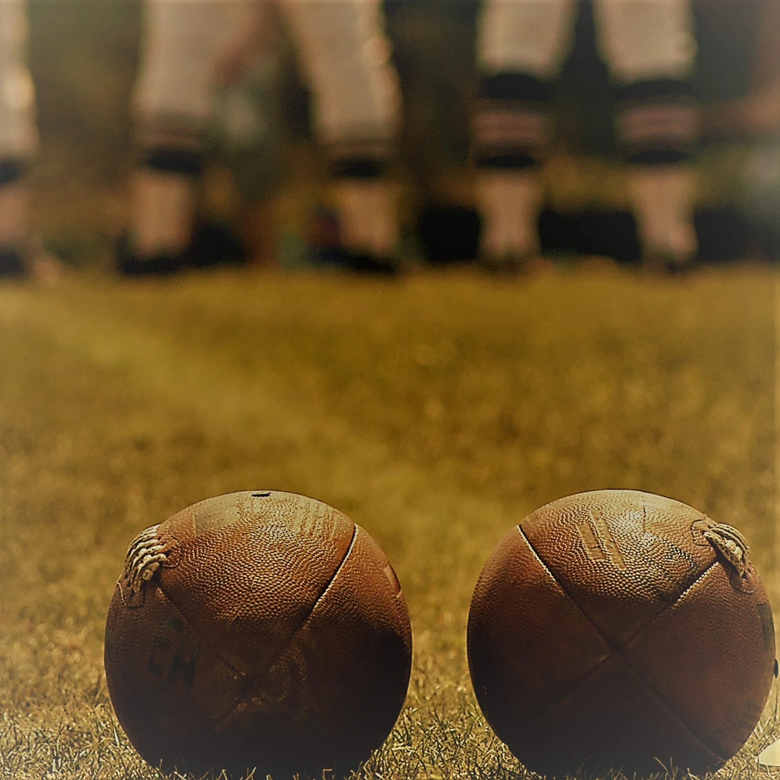 2 footballs.jpg