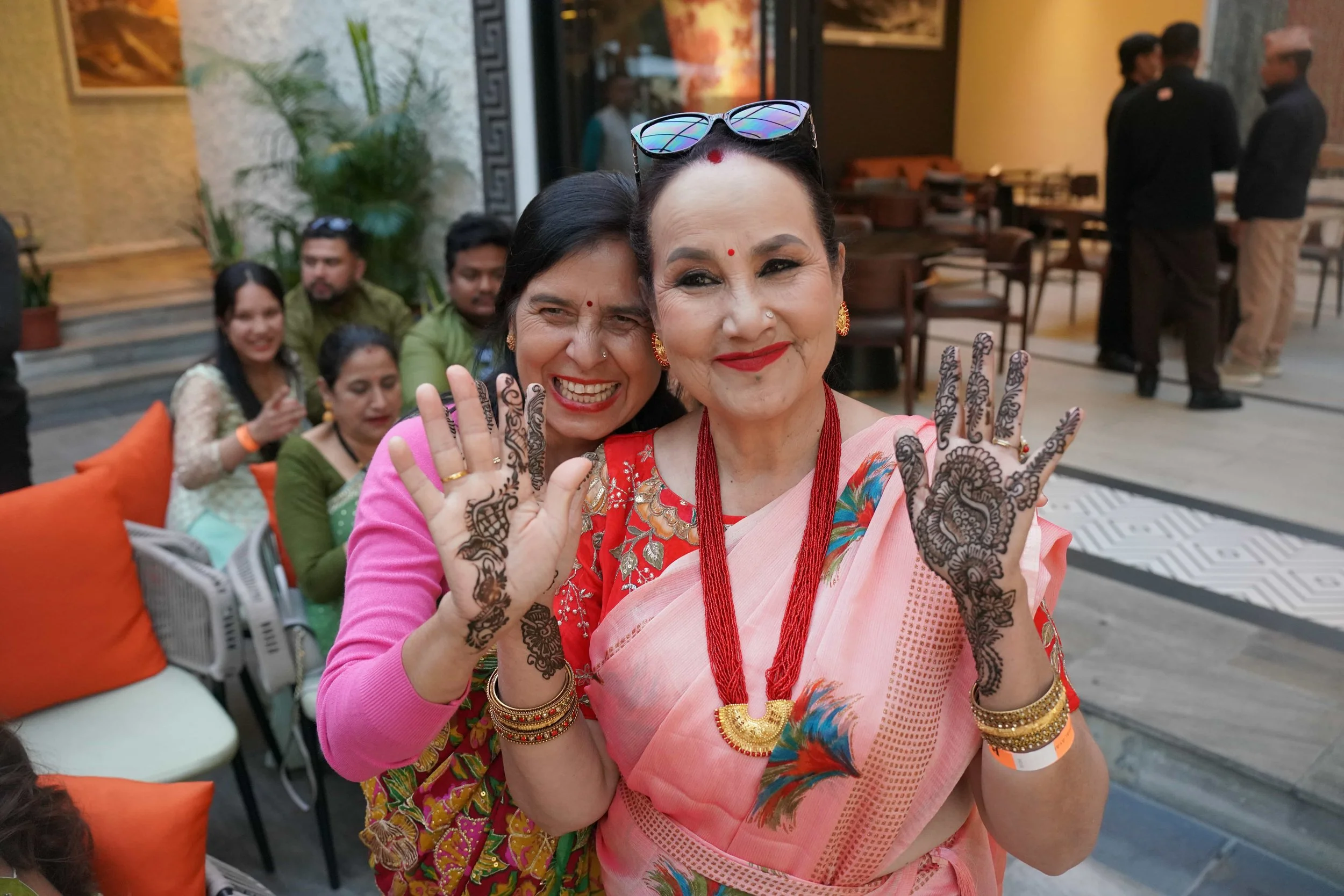 2025-11-26 16.54.20 - Shobha and Mana with mehndi'ed hands, Aayush & Situsit’s pre-wedding event for mehndis and music, Banmanche restaurant, Kathmandu, Nepal - DSC08893 optimized.JPG