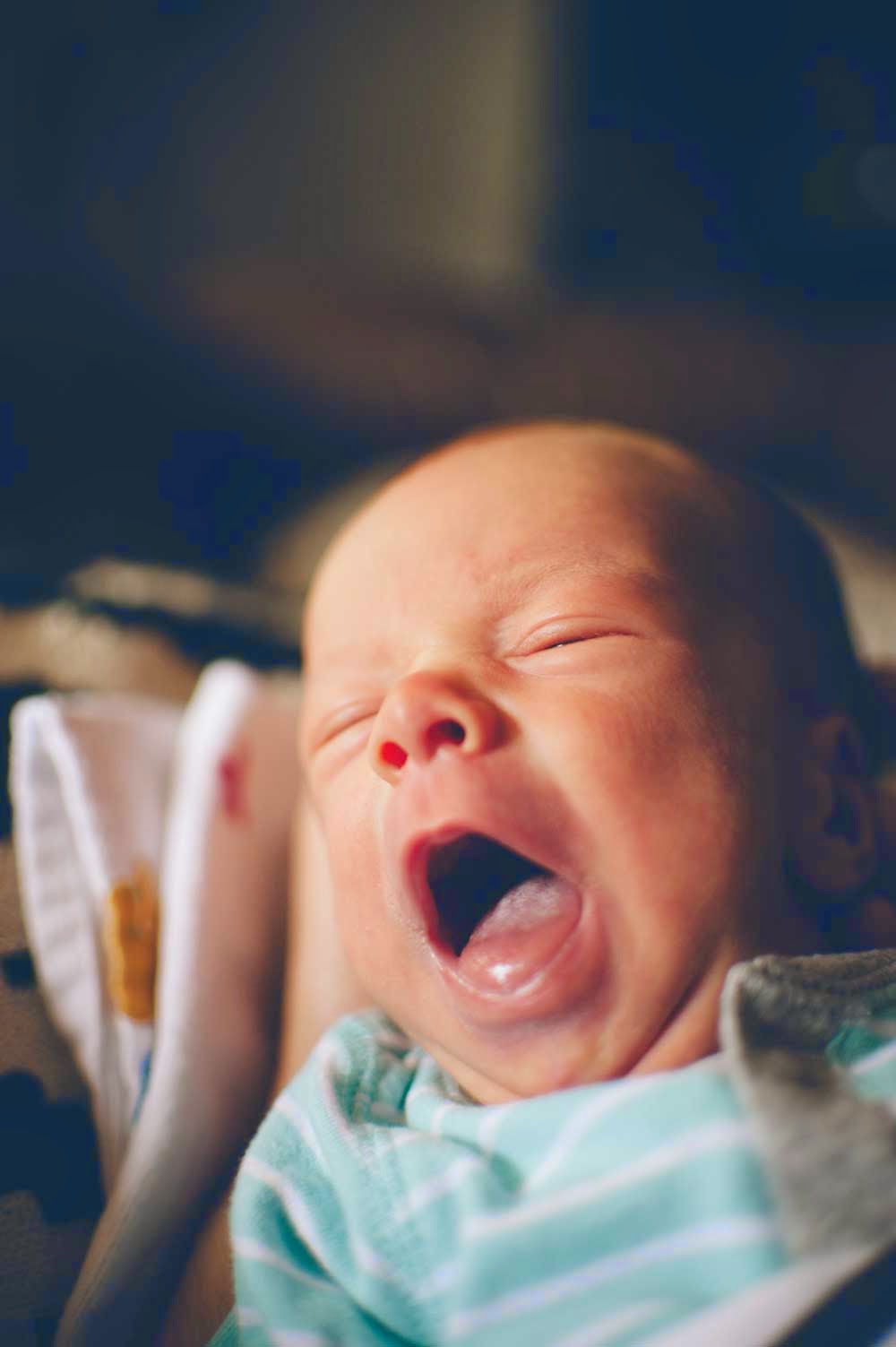 Sometimes, this is how Sam feels about being a baby. (Usually, though, he's much more chill than this.) 