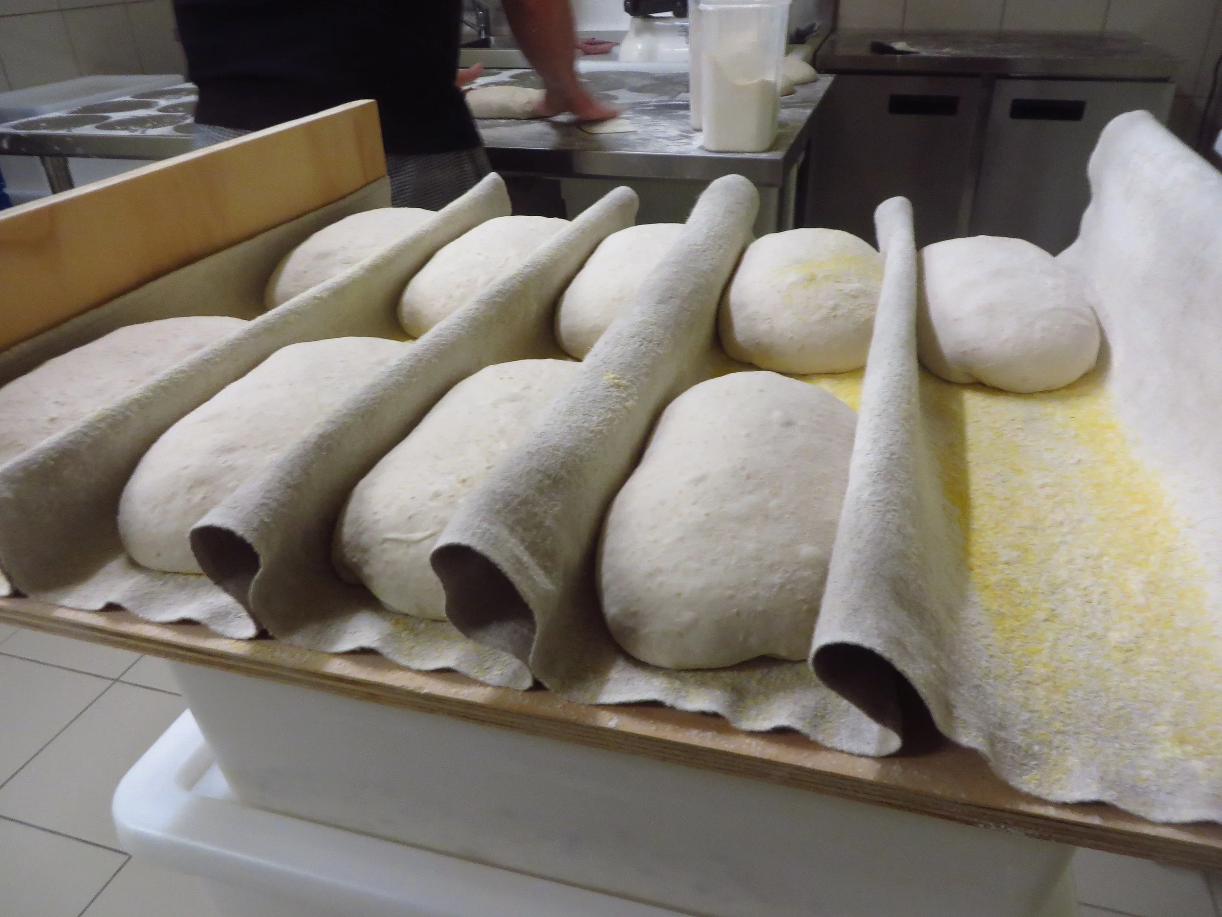 The doughs are then given a final shape and placed in linen couching cloth to rest for another two hours.