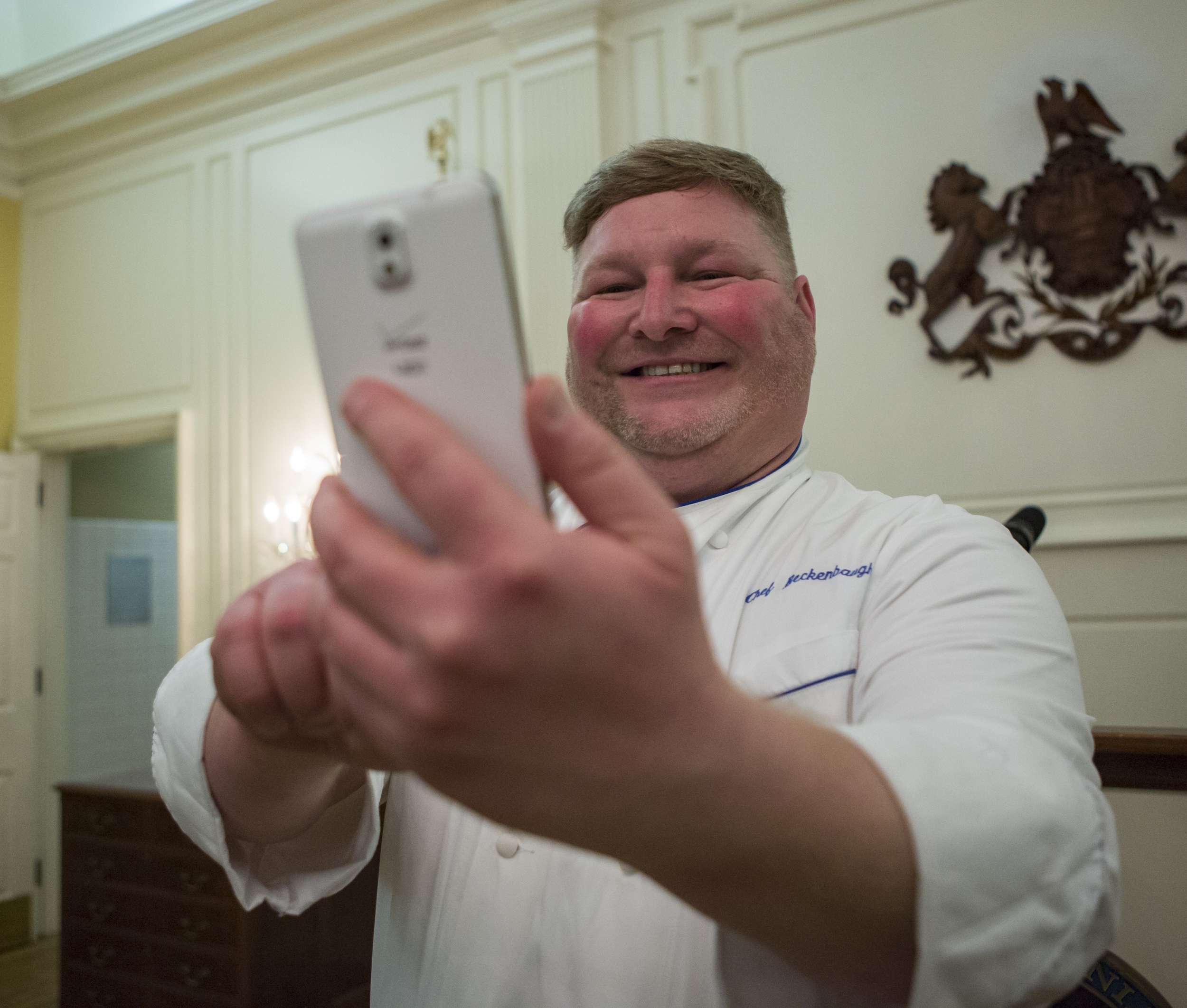 CPI culinary intructor Tim Beckenbaugh takes a selfie in one of the dining rooms of the Governor's Residence after dinner service on Monday, April 11, 2016.