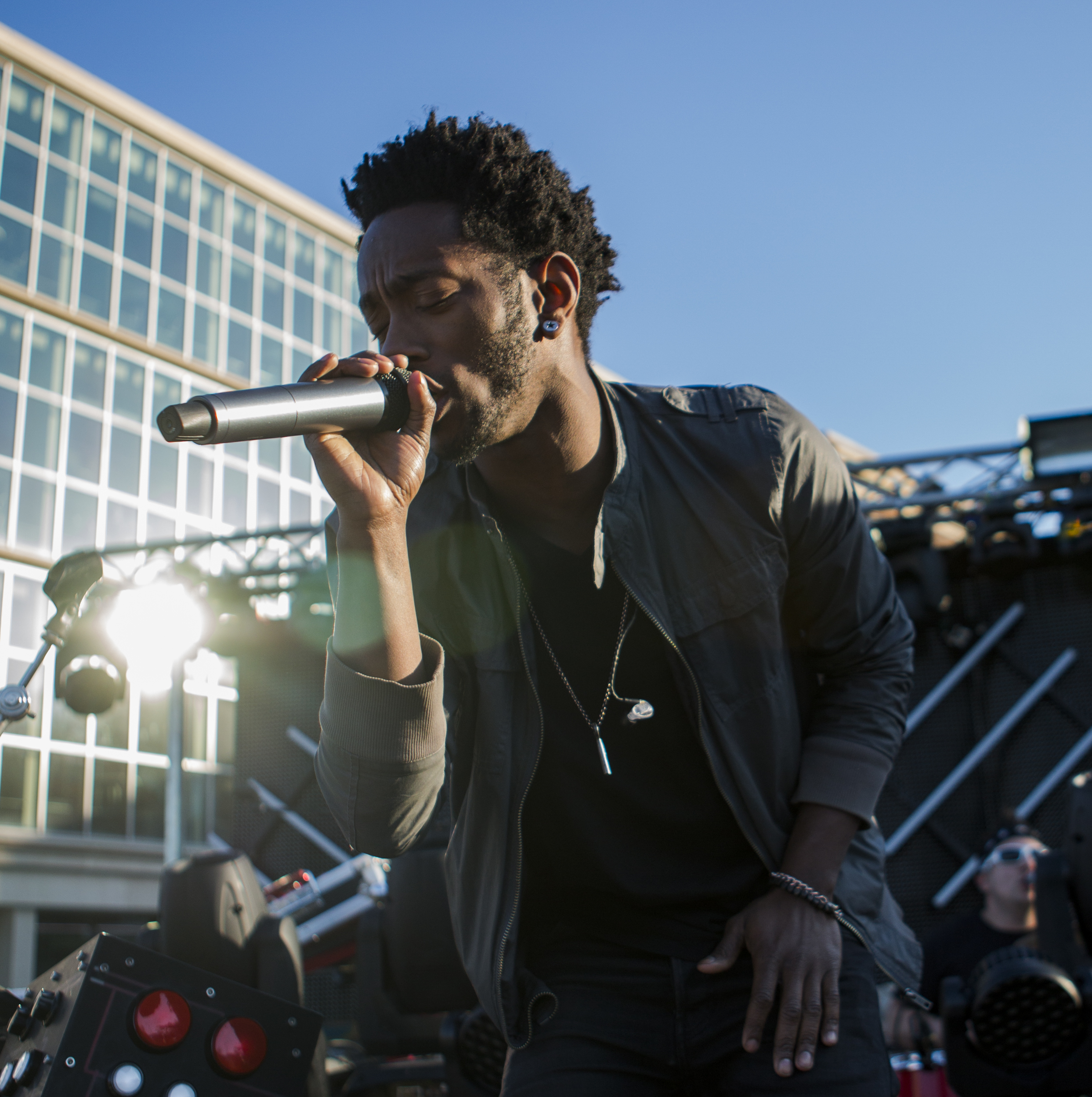 Go Go Gadjet vocalist Rayvon Reed performs with the band on the HUB lawn as part of PSiheartU week on Thursday, April 14, 2016.