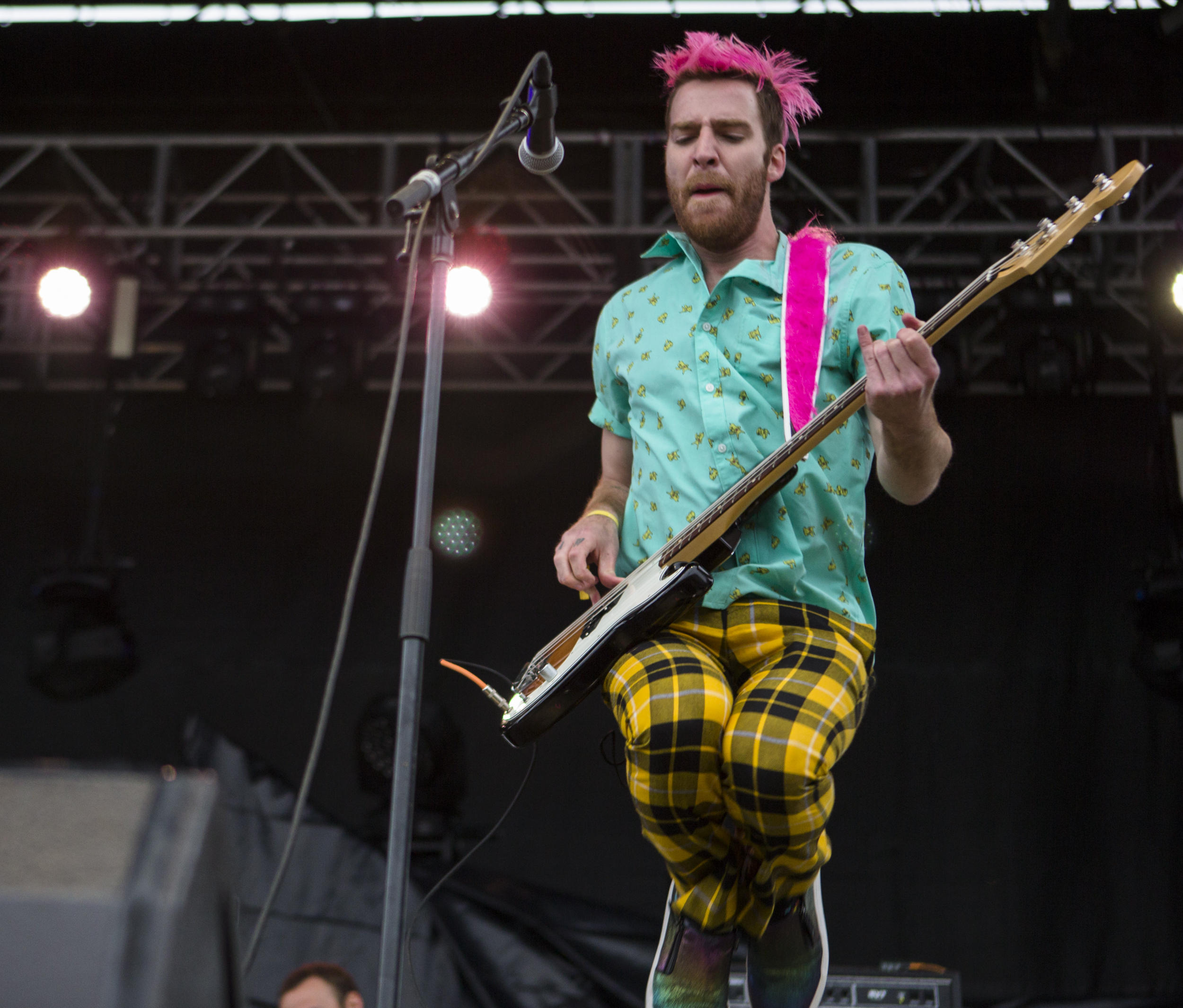 Bassist William Hehir performs with Misterwives at Movin' On Music Festival on the IM fields on Friday, April 29, 2016.