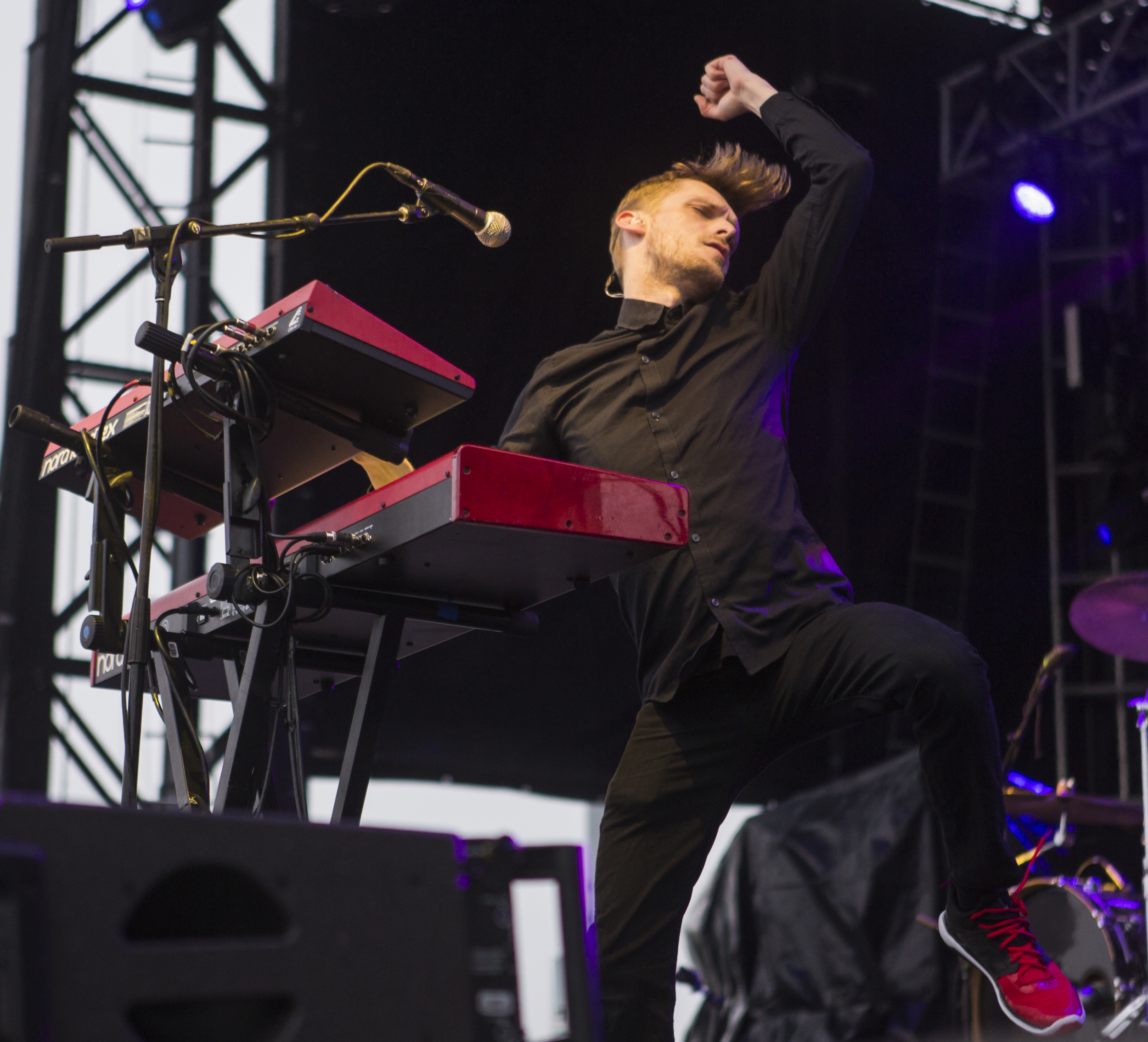 Keyboardist Casey Harris performs with the X Ambassadors during Movin' On Music Festival on Friday, April 29, 2016.