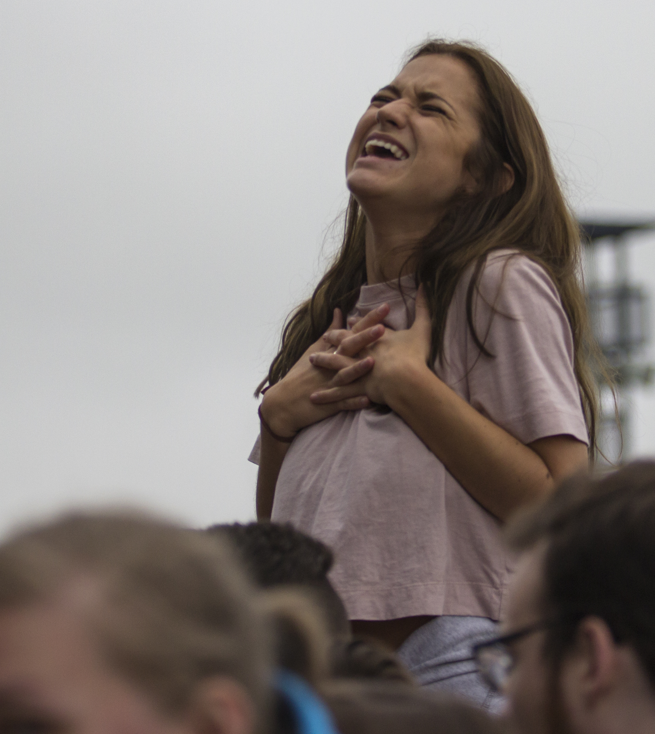 A fan sings along to "Mr. Brightside" by The Killers between Misterwives and X Ambassadors' sets during Movin' On Music Festival on Friday, April 29, 2016.