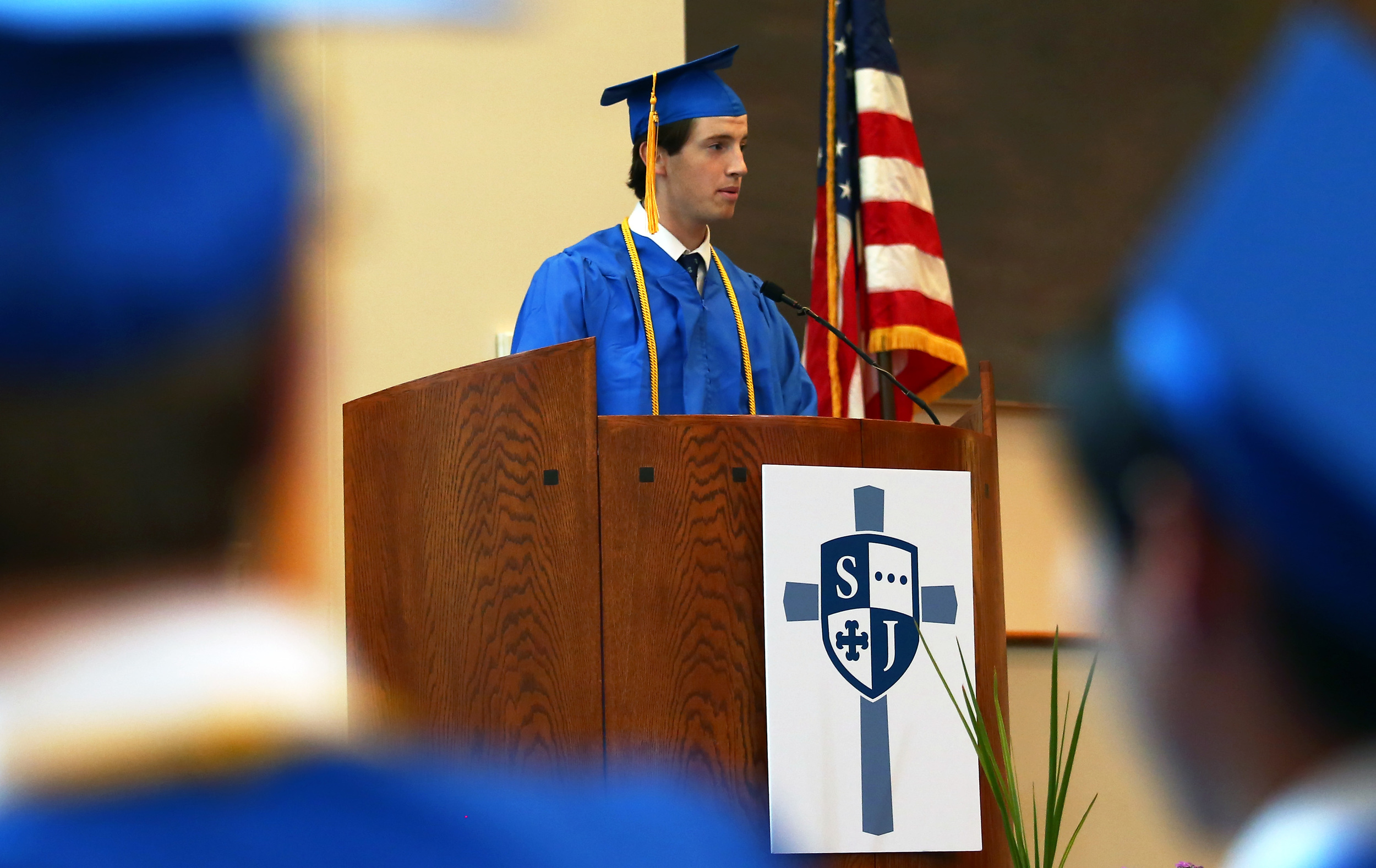 Saint Joseph's Catholic Academy graduating senior Michael Forstmeier speaks to his graduating classmates and audience members during the graduation ceremony at Pasquerilla Spiritual Center on Saturday, May 21, 2016.