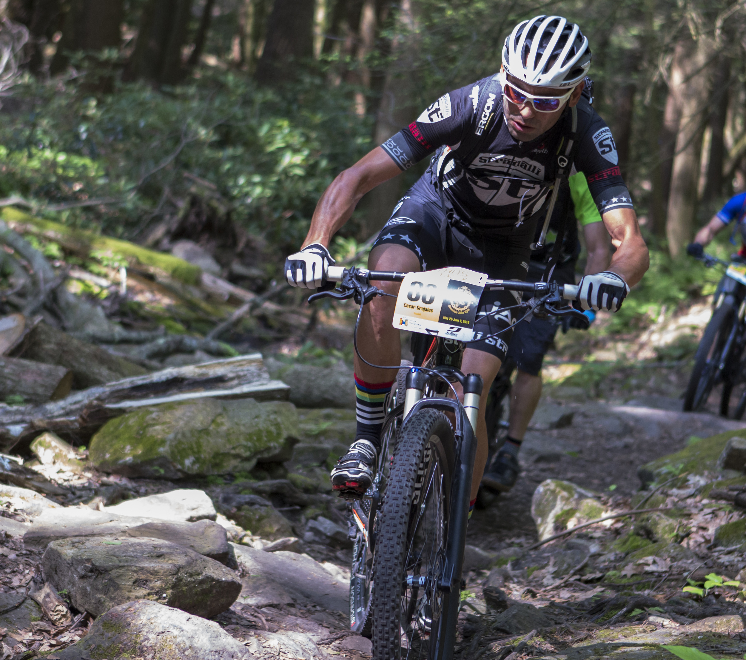 Stradalli team rider Cesar Grajales navigates the rocks in Shingletown Gap during the third stage of the Tran-Sylvania Epic Mountain Bike Ride on Wednesday, June 1, 2016.