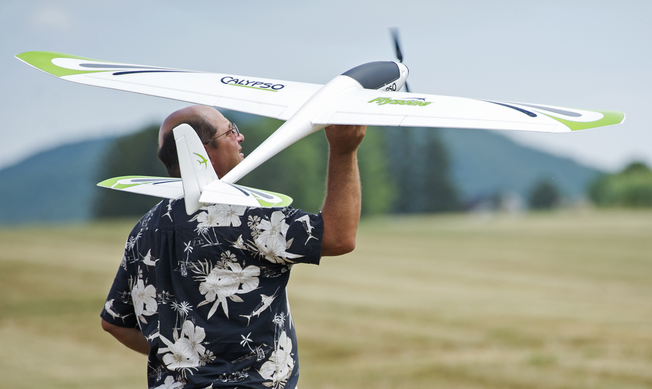 State College Radio Control Club president Jon Guizar of Bellefonte launches his Calypso glider during the glider demonstration portion of the club's air show held at Centre Airpark in Centre Hall on Sunday, July 24, 2016.