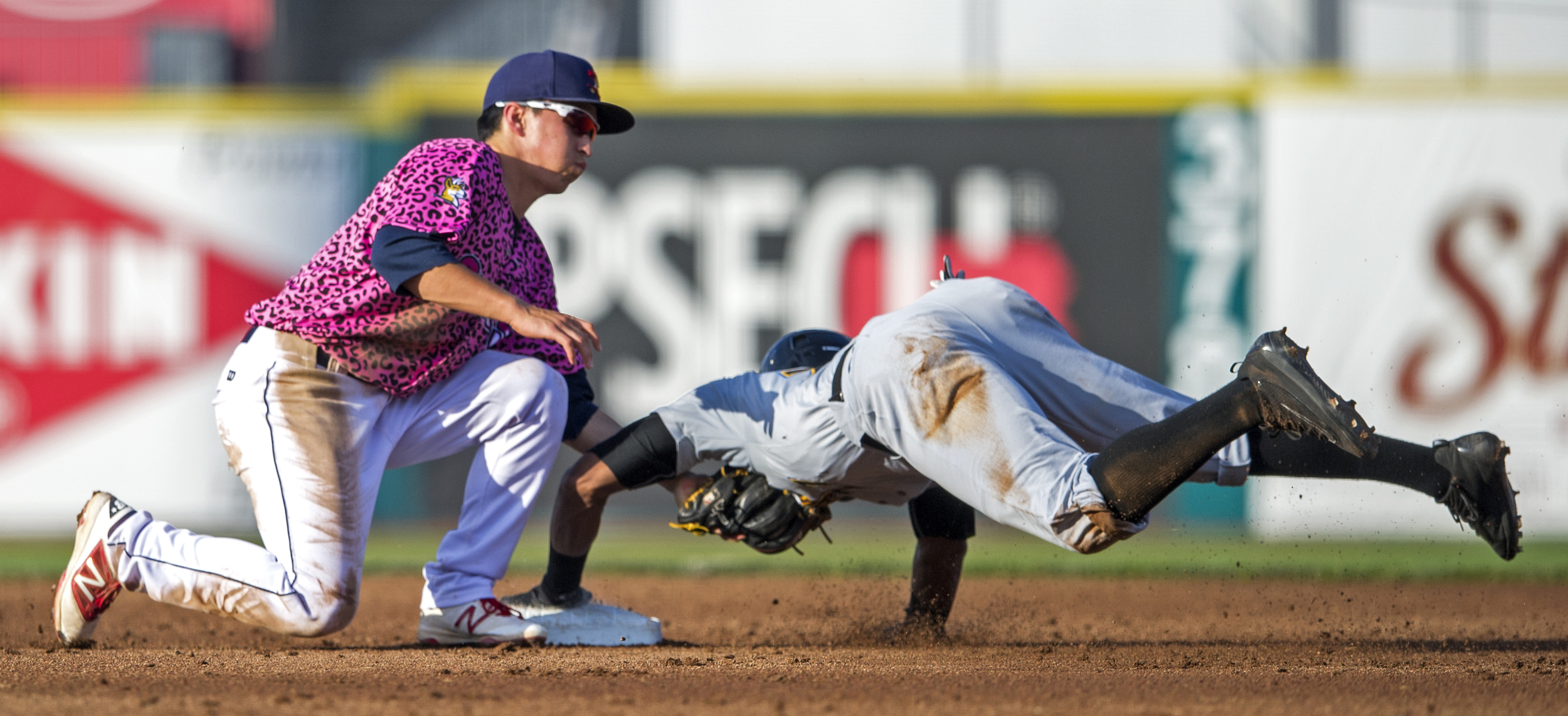 State College Spikes short stop Tommy Edman tags out West Virginia Black Bears center fielder Sandy Santos as he attempts to steal second base during the first game of their series at Medlar Field on Sunday, July 31, 2016.