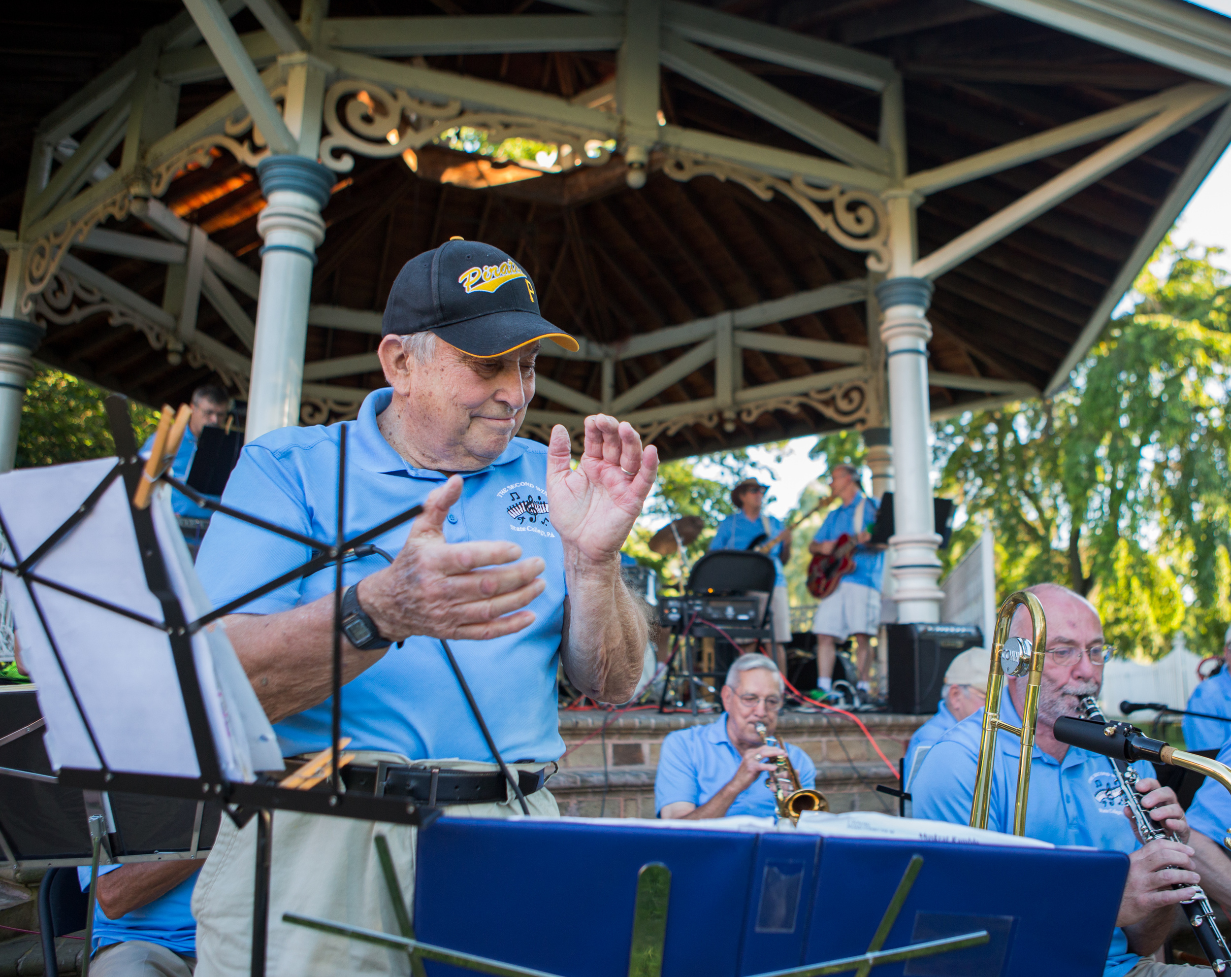 Theodore Elwood Fuller claps as and prepares to sing "The Pennsylvania Polka" with The Second Winds as part of the weekly concert series at the gazebo in Talleyrand Park in Bellefonte on Sunday, Aug. 7, 2016.