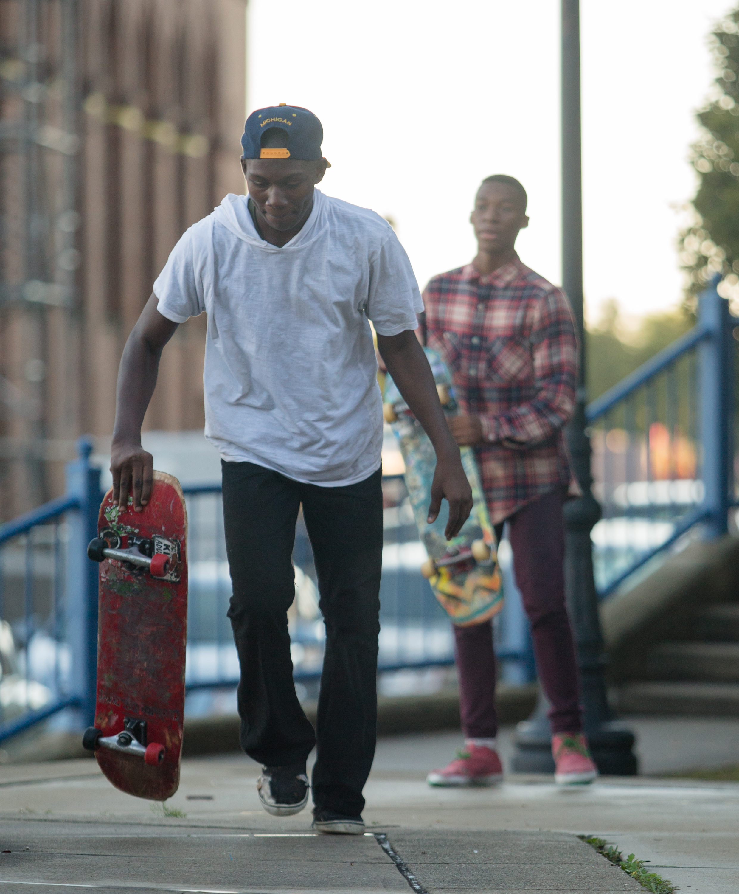 Gevante Wilson starts his run while his brother Gerald Lamar Wilson waits behind him on the steps behind the Imagination Station in downtown Toledo on Saturday, Sept. 17, 2016.
