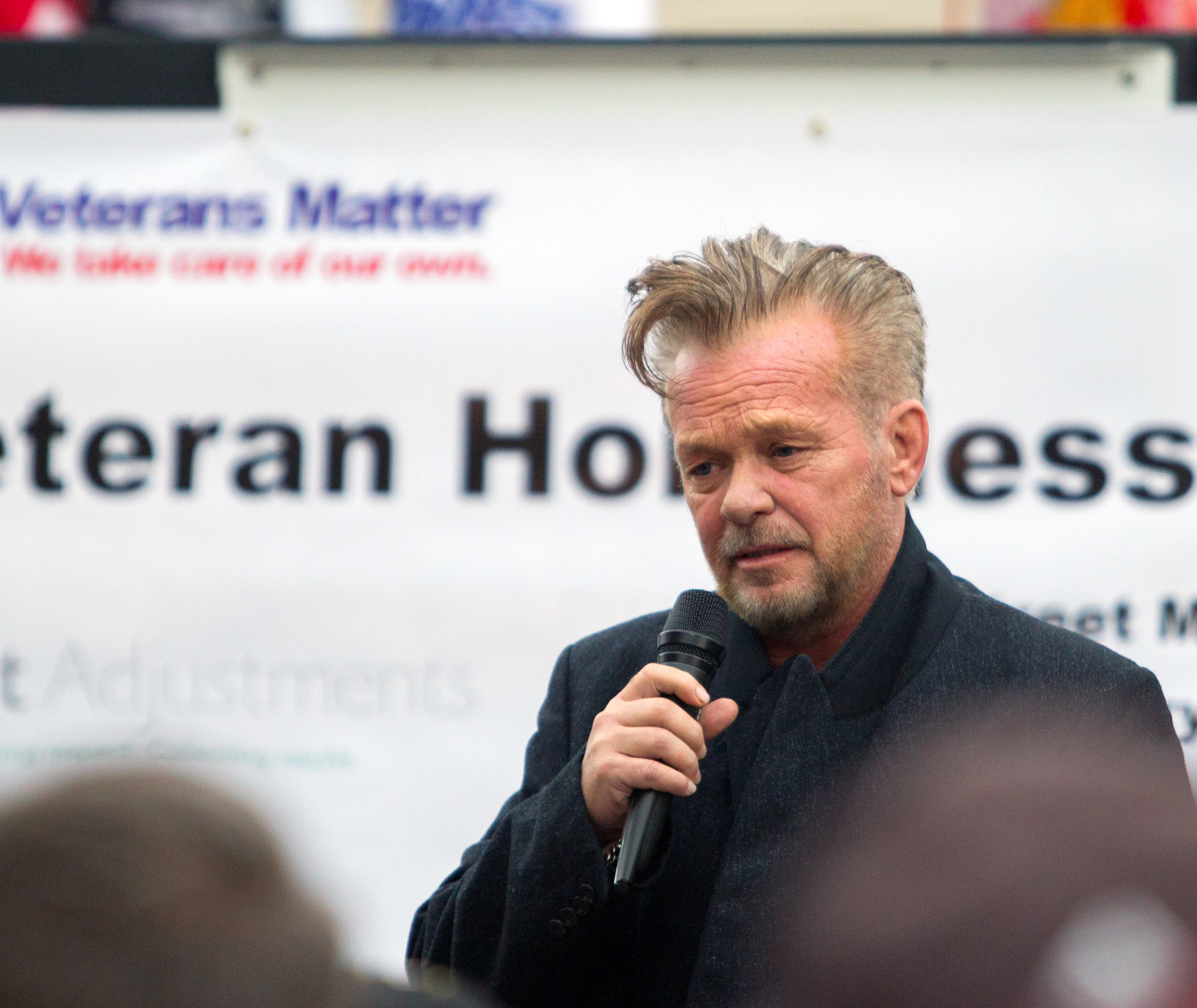 Tent City honorary mayor John Mellencamp speaks before the Walk to End Veteran Homelessness at the Civic Center Mall in Downtown Toledo on Friday, Oct. 21, 2016.