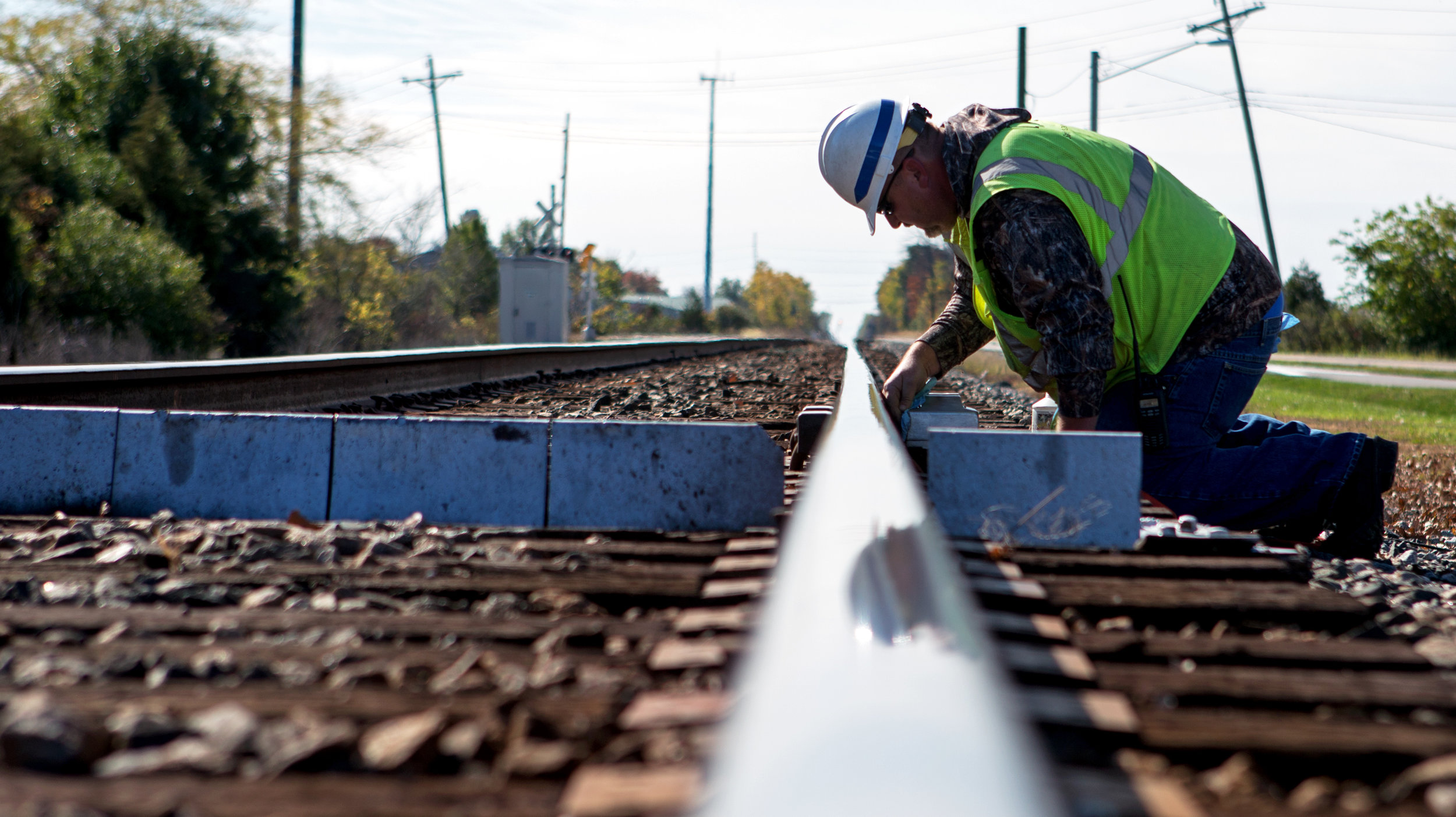 CSX signal maintainer Matt McDonald of Willard, Oh. tests the defect detection device on a section of railroad off of Fort Meigis Rd. near the Little Township Baseball Field in Perrysburg on Tuesday, Oct. 25, 2016. The defect detection system reads temperatures and detects anything dragging from train cars as they pass and notifies the headquarters and dispatch of any malfunctions.