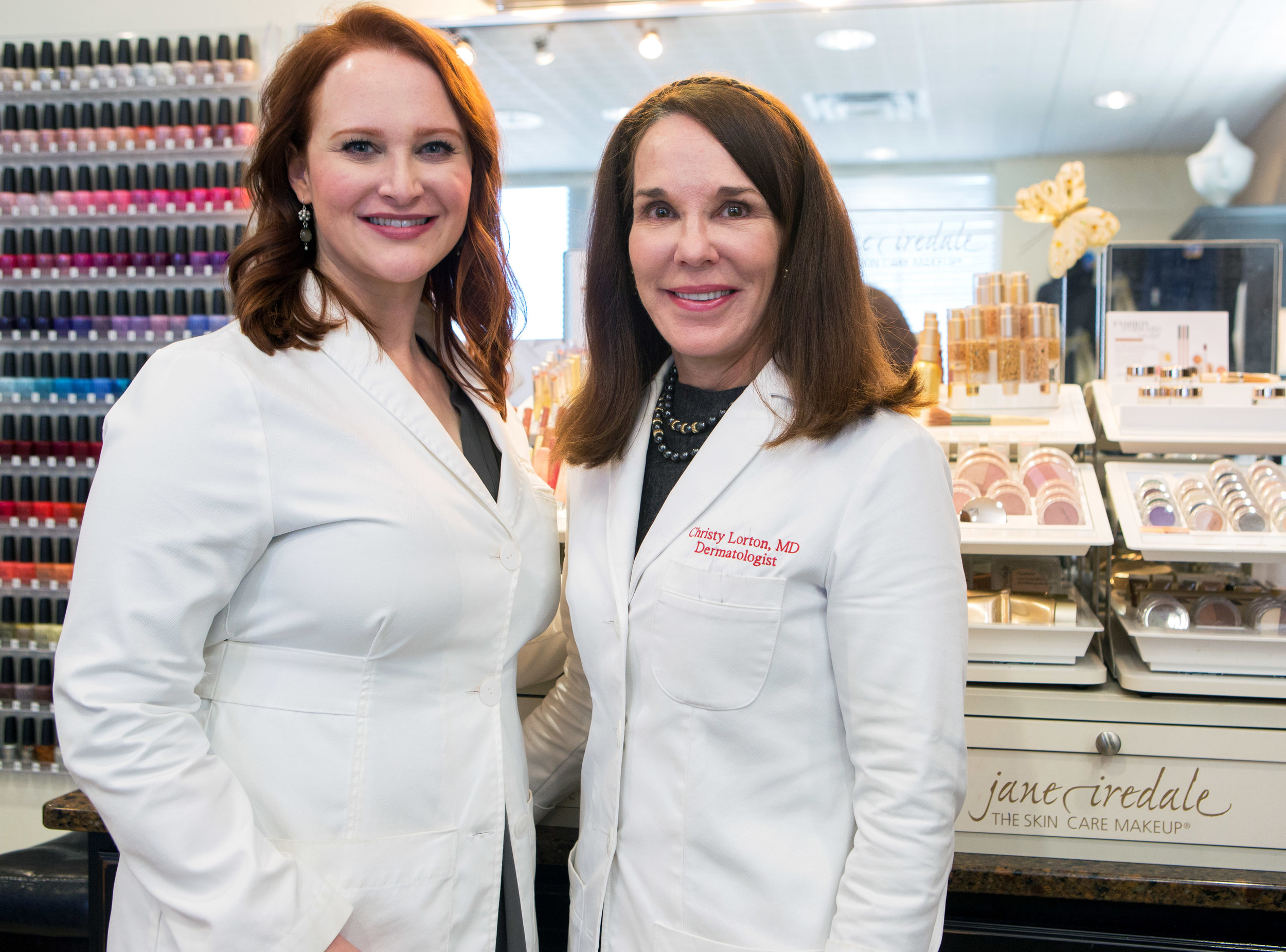 Founders of Dermatology Associates Dr. Sarah Stierman, left, and Dr. Christy Lorton pose for a photograph in Ada Aesthetics spa in their office in Perrysburg on Thursday, Oct. 3, 2016. 