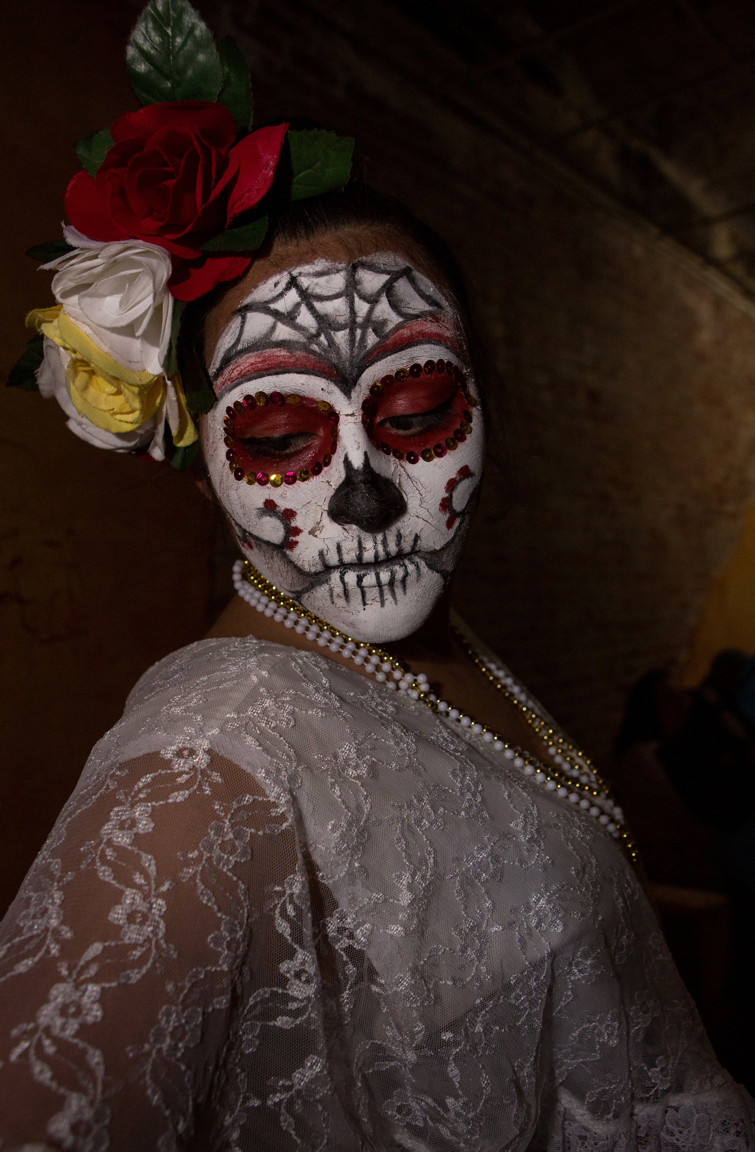 Cecillia Montoya of Toledo poses after having her make up done to perform with the Ballet Folklorico Imagenes Mexicanas during the Sofía Quintero Art and Cultural Center's 20th annual Day of the Dead celebration at on Broadway St. in Toledo on Saturday, Nov. 5, 2016. 