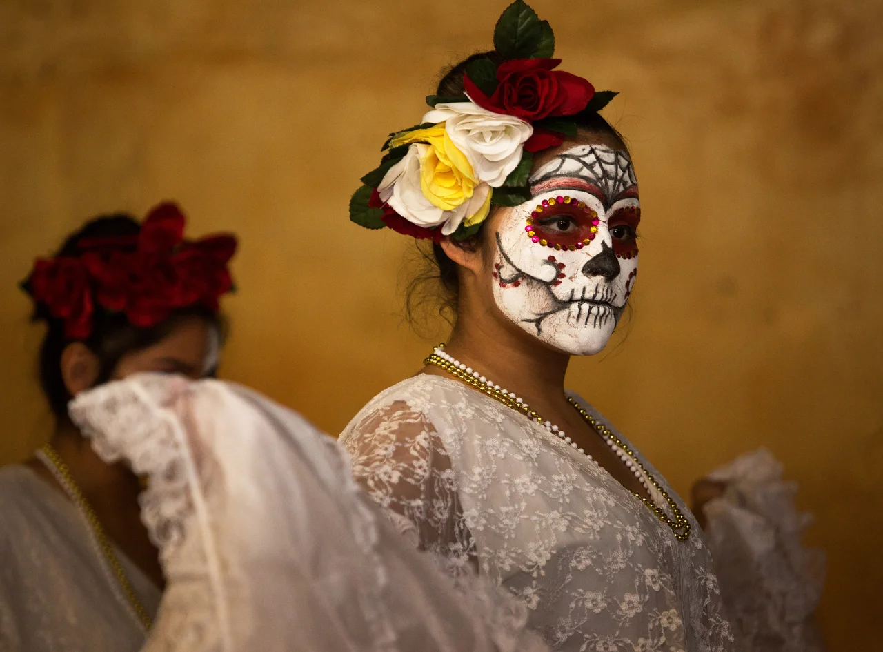  Cecillia Montoya of Toledo rehearses choreography with the Ballet Folklorico Imagenes Mexicanas at the Jose Martinez Memorial Galeria during the Sofía Quintero Art and Cultural Center's 20th annual Day of the Dead celebration at the on Broadway Stre