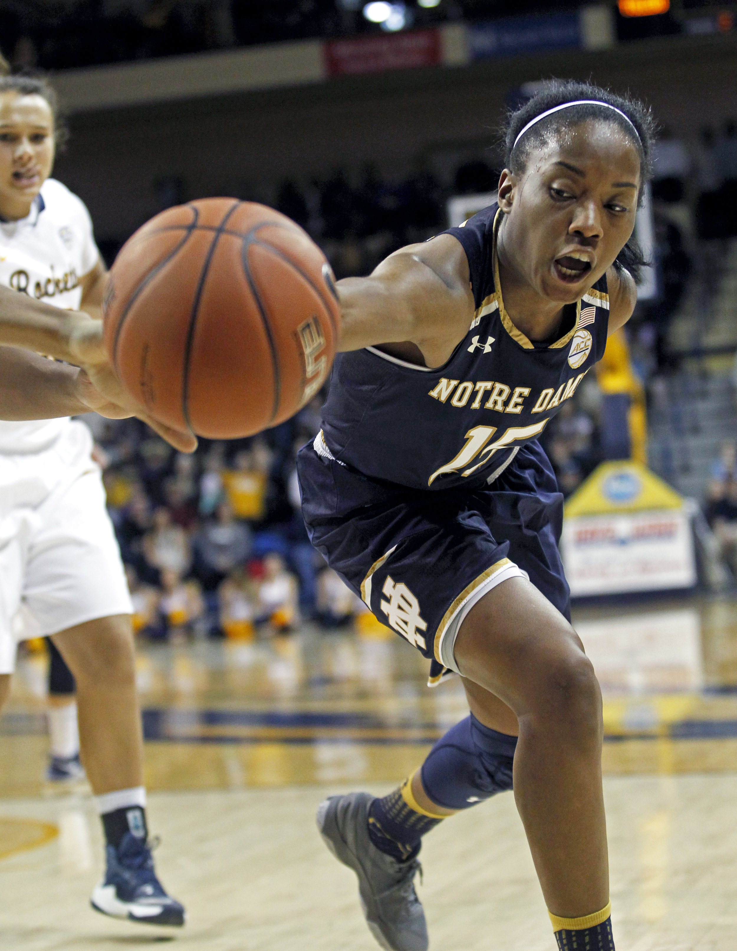 Notre Dame guard Lindsay Allen (15) reaches for a loose ball in an attempt to keep it from going out of bounds during the women's basketball game at Savage Arena on the University of Toledo's campus on Sunday, Dec. 18, 2016. 