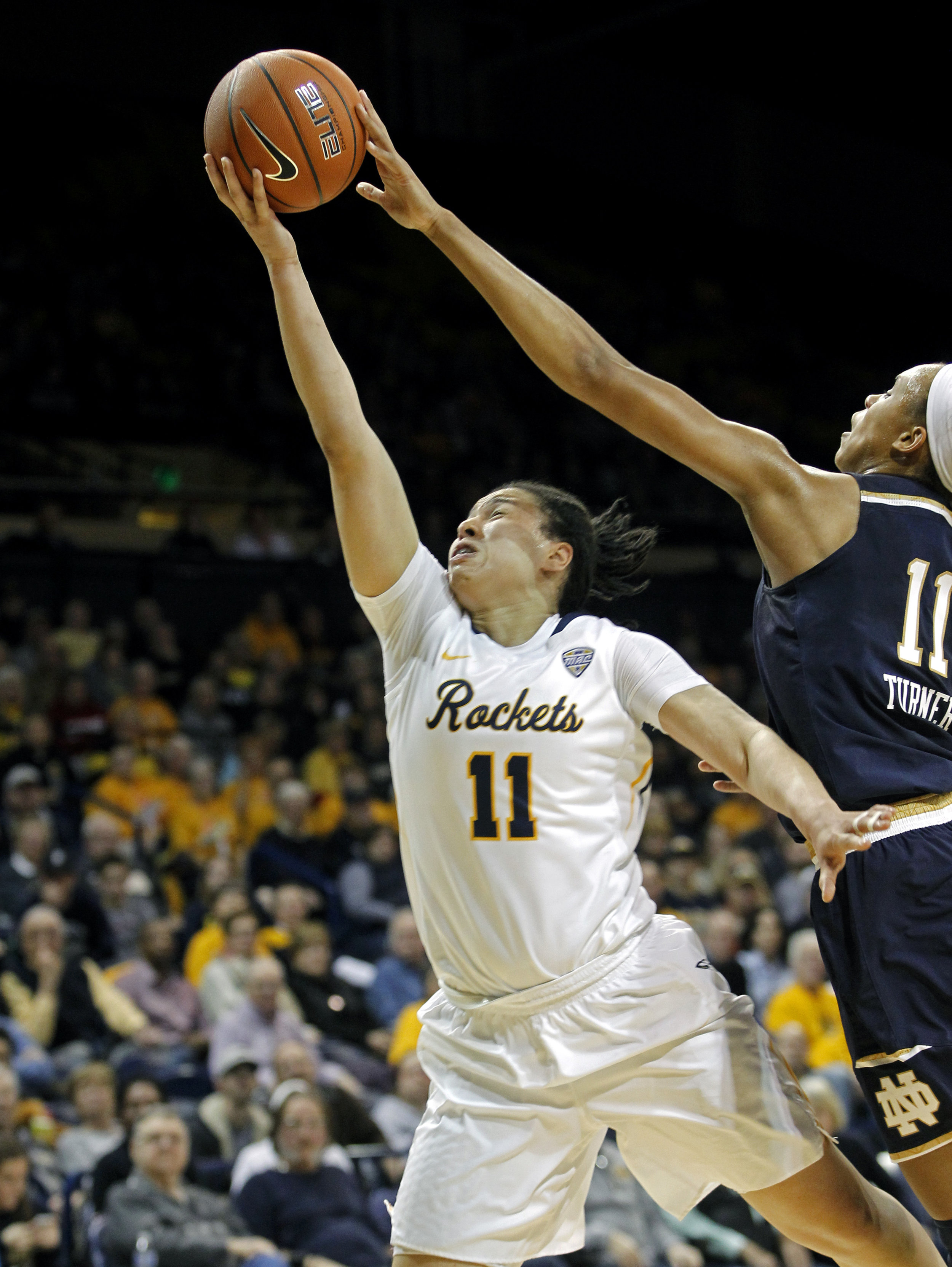 University of Toledo guard Jay-Ann Bravo-Harriott's (11) layup is blocked by Notre Dame forward Brianna Turner (11) during the women's basketball game at Savage Arena on the University of Toledo's campus on Sunday, Dec. 18, 2016.