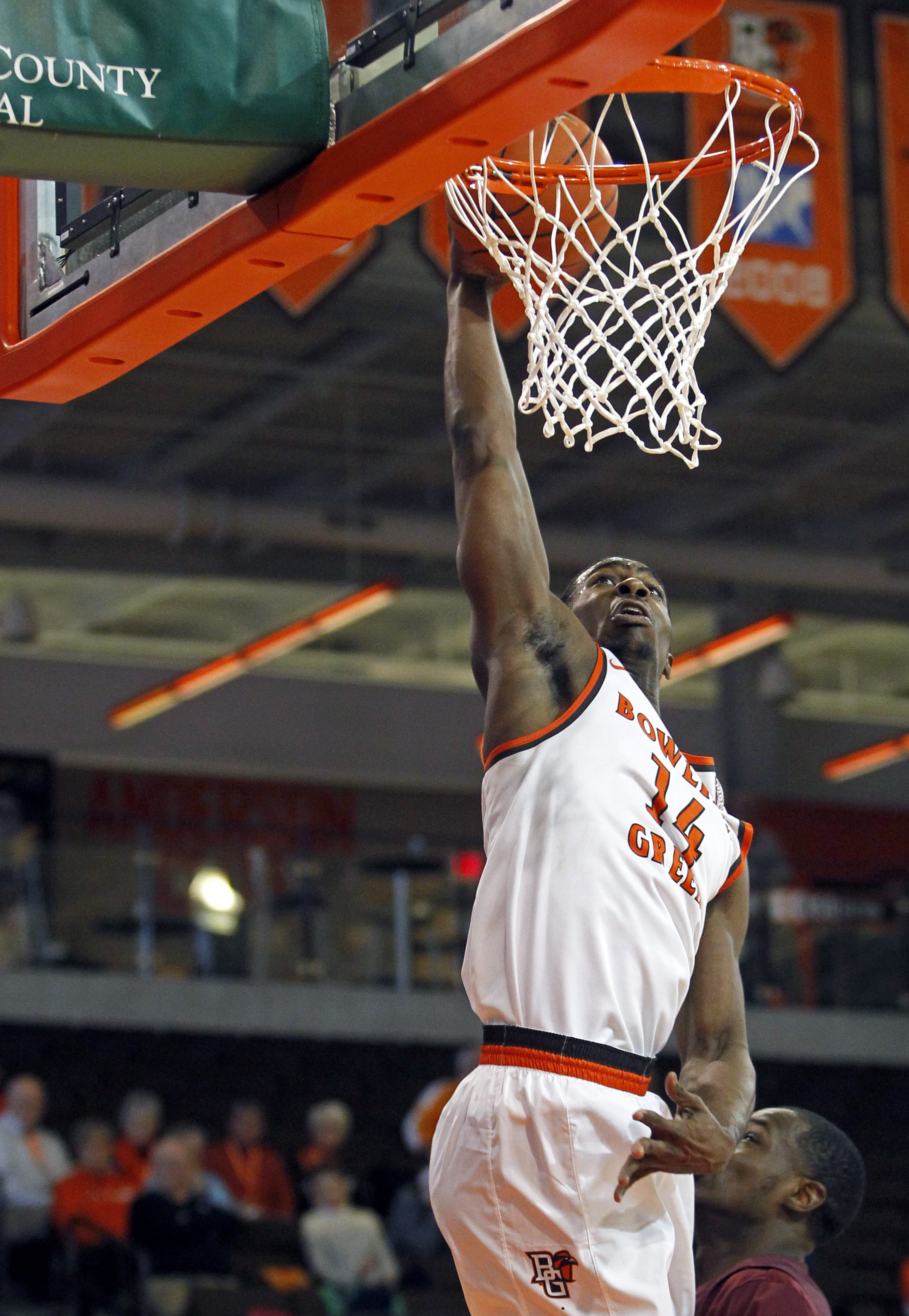 BGSU forward Wes Alcegaire (14) jumps for a slam dunk during the men's basketball game against Alabama A&M at the Stroh Center in Bowling Green, Oh. on Thursday, Dec. 22, 2016. BGSU won the game 74-61. 