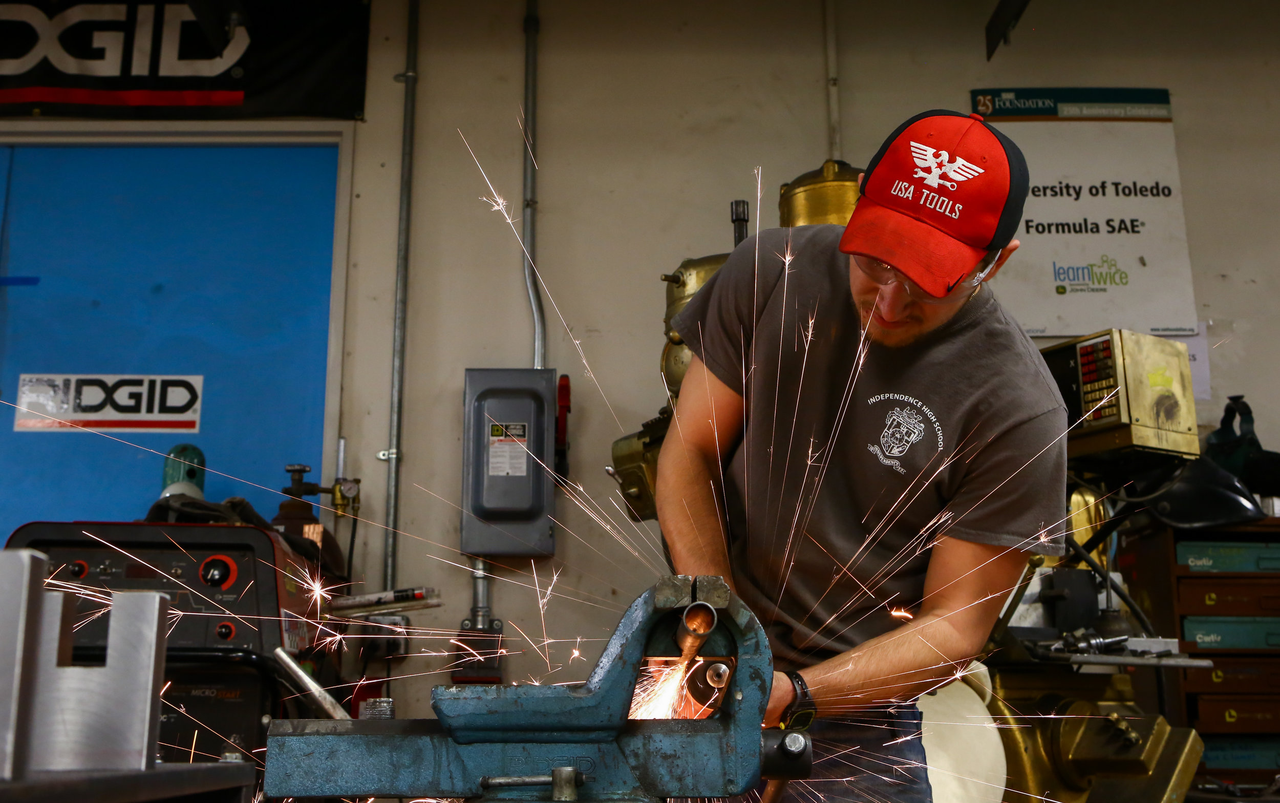 Colin Jedrzejek works on cutting chassis tubing to the correct length as the team begins welding the current season car’s chassis together in the Formula SAE team lab.