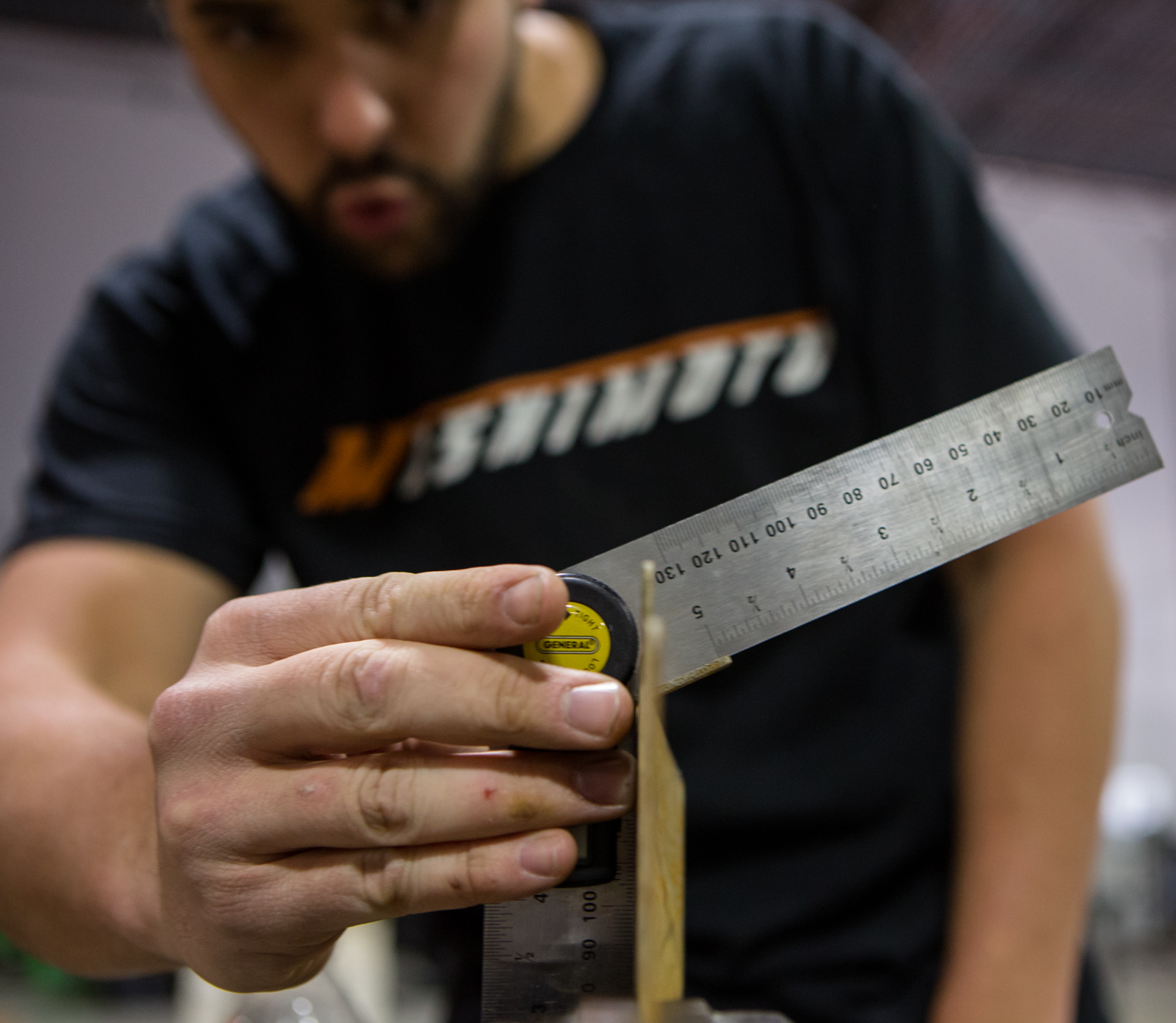 Steve Wiley excited about bending the shroud bracket to the correct angle on the first try.
