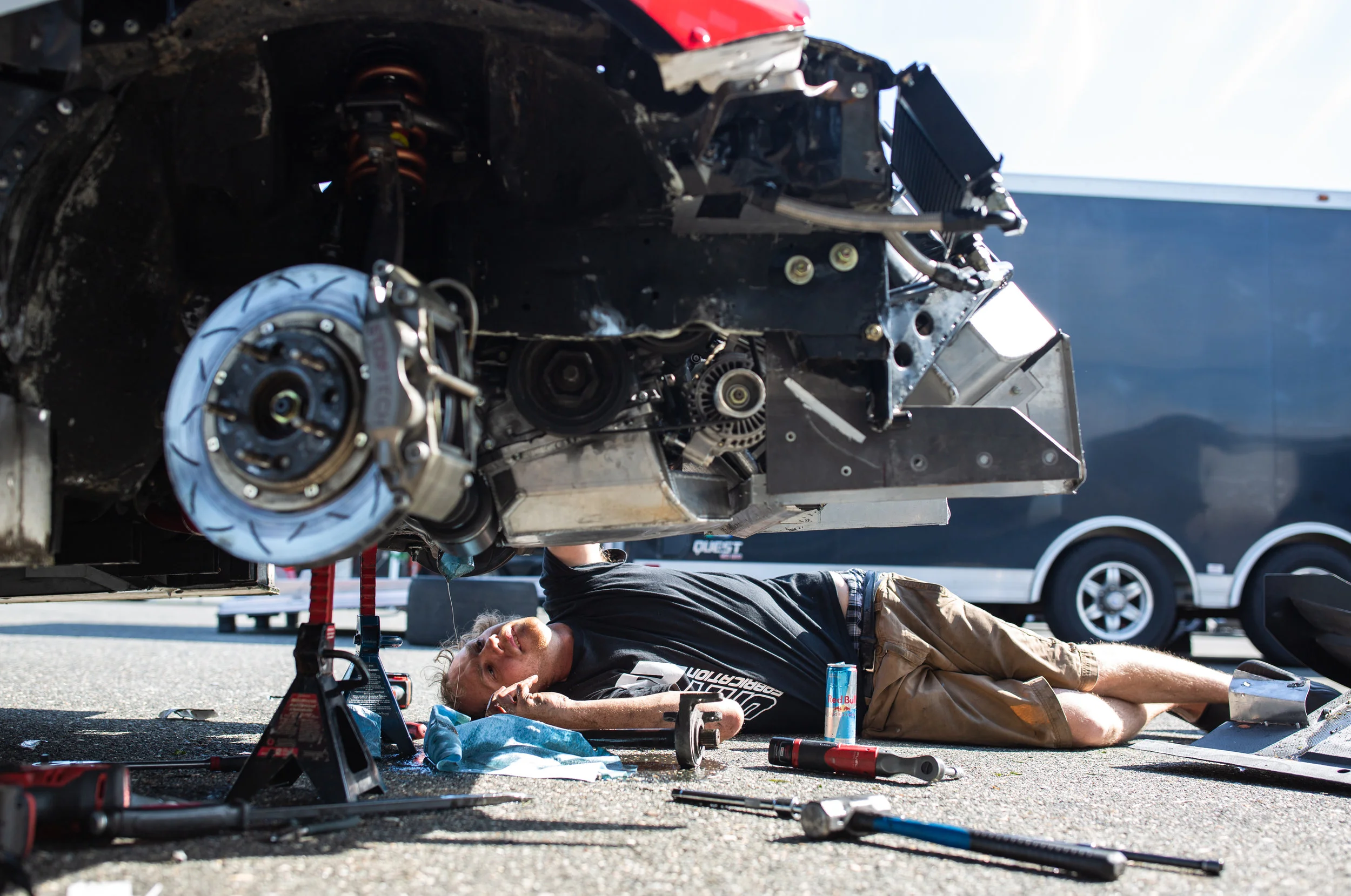 Mitchell Hemmen works on removing a severed axle in the K-Tuned Integra Type R that lodged itself in the car’s transmission