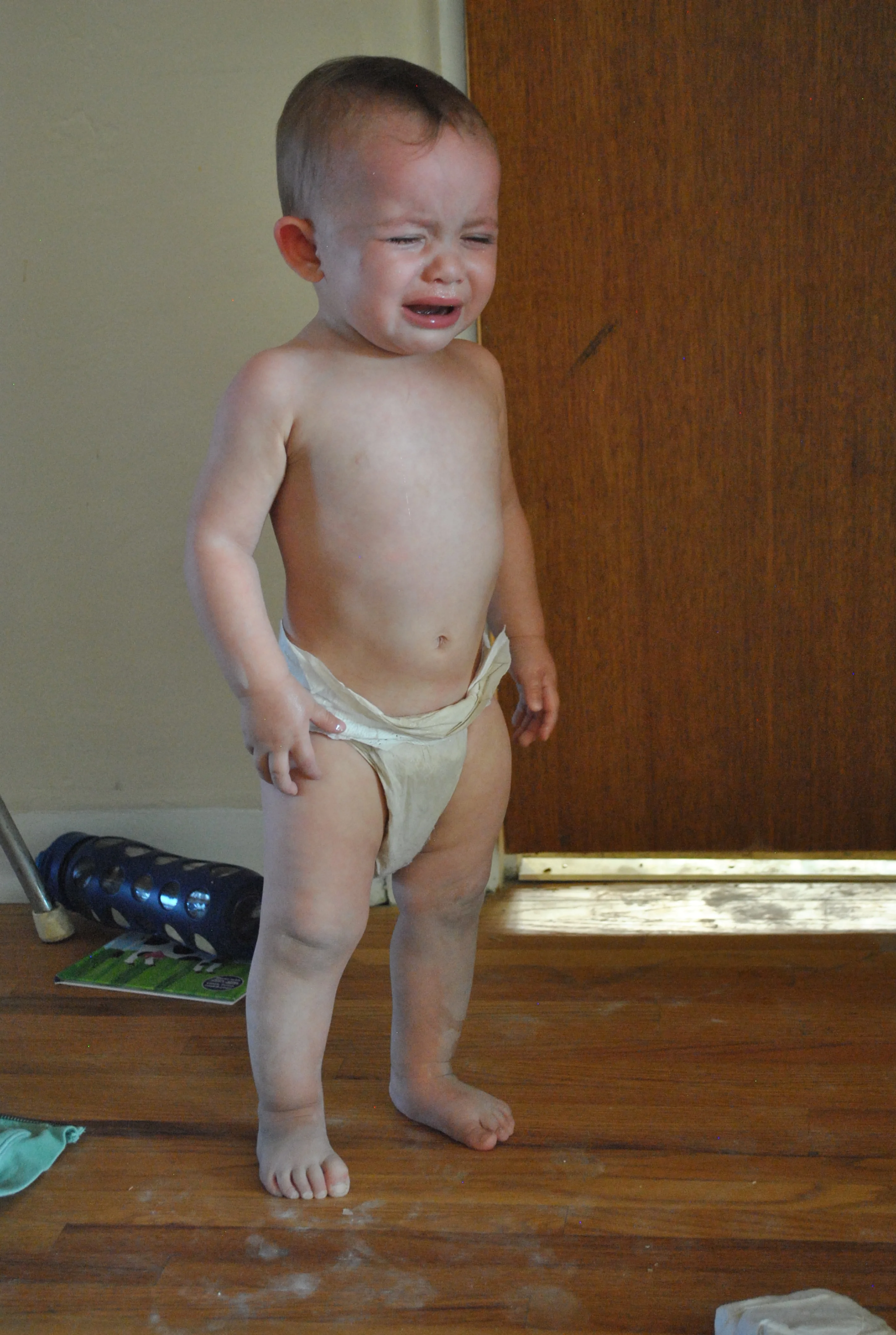 It's not today, actually, it's from the other day when we were regrouting our kitchen. Today, I've got her in a prefold diaper so she can tell me when she's put poopies in her pants.