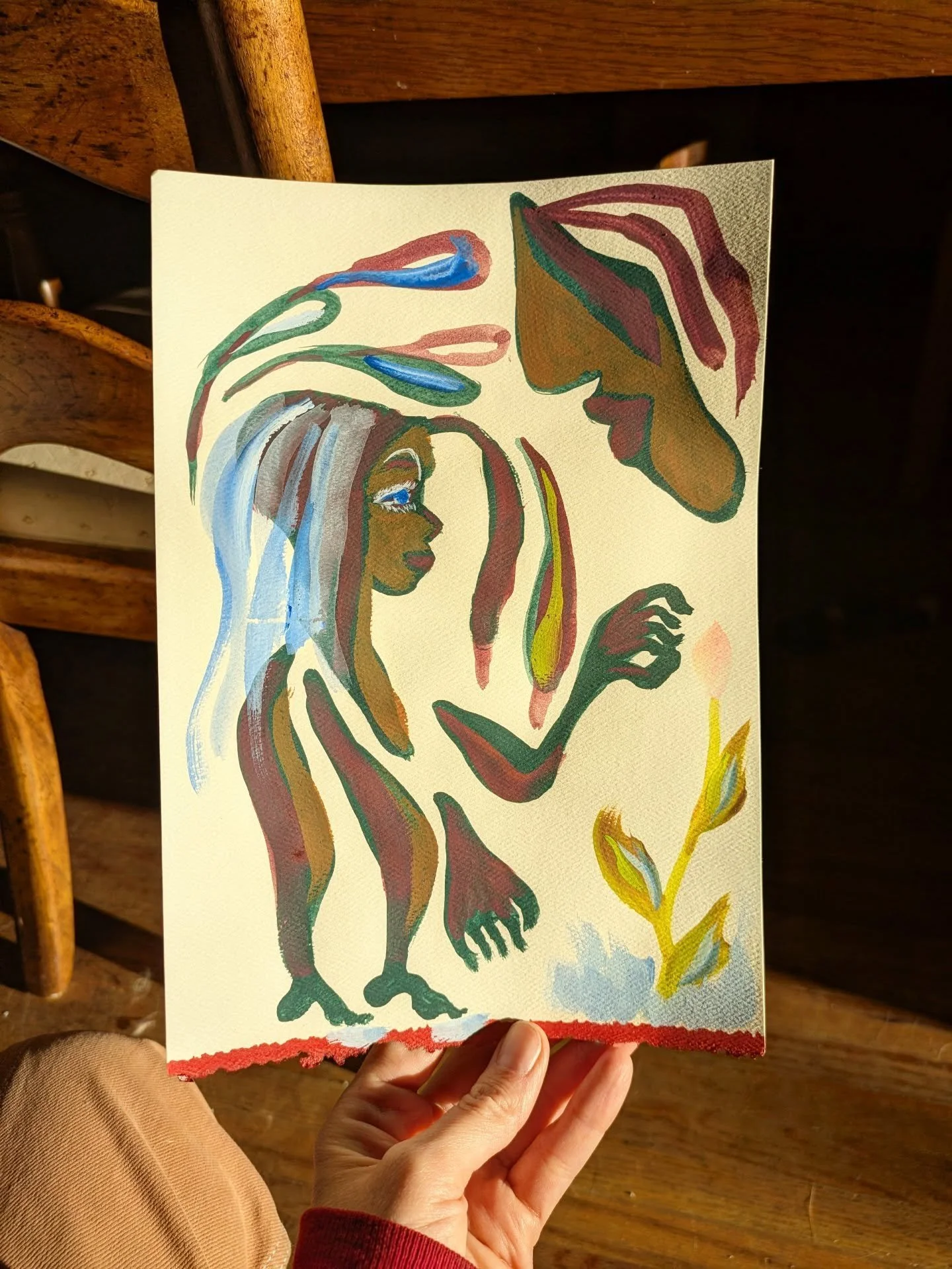 Sitting on the floor with the piece I finished last night.