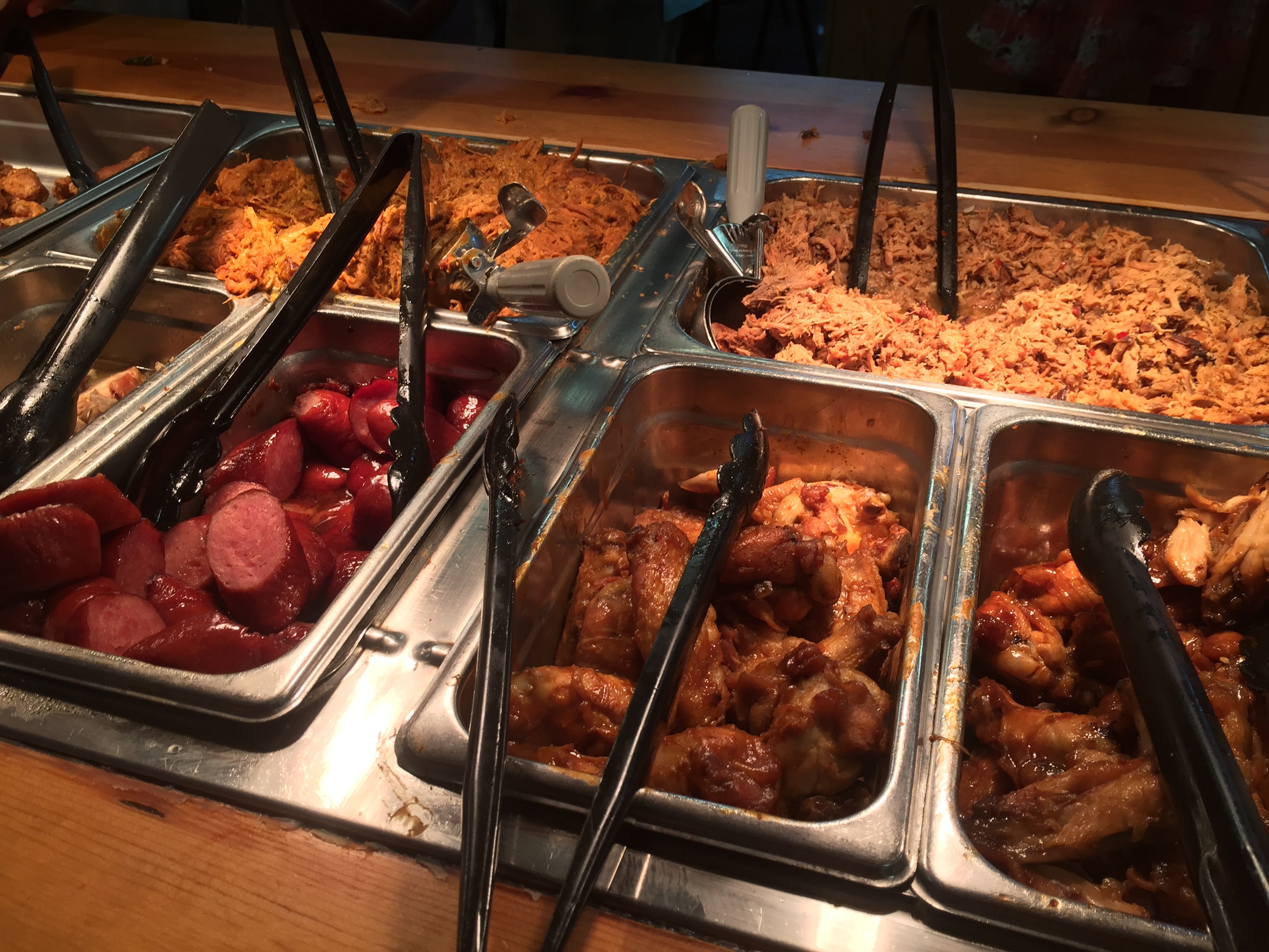 That's mustard sauce bbq on the back left, and vinegar to the right.