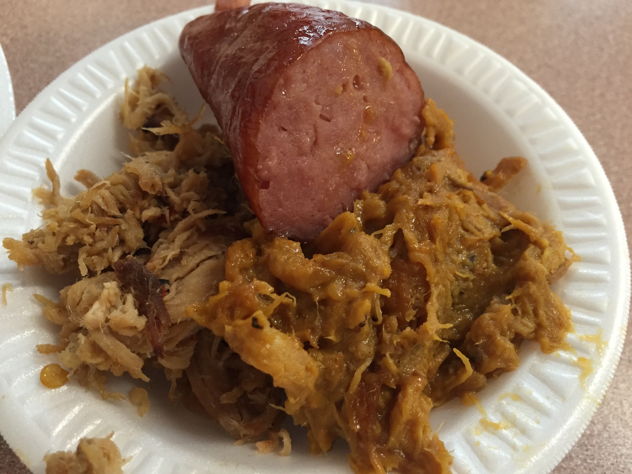 Little Pigs Barbecue: pulled pork with vinegar, pulled pork with mustard, and a chunk of sausage.