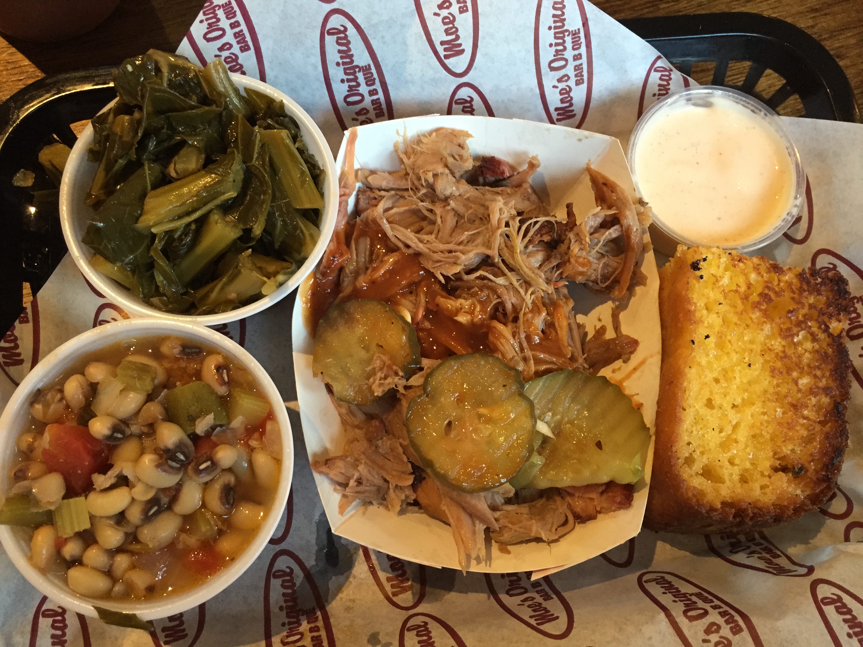 Alabama style BBQ from Moe's Original in Asheville North Carolina, note the white sauce.