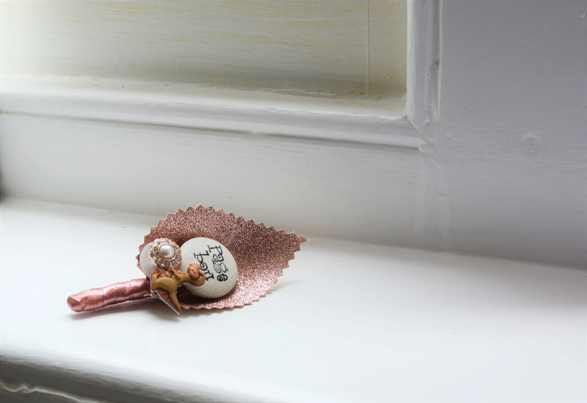 Rose Gold Page Boy Wedding Buttonhole with Dinosaur