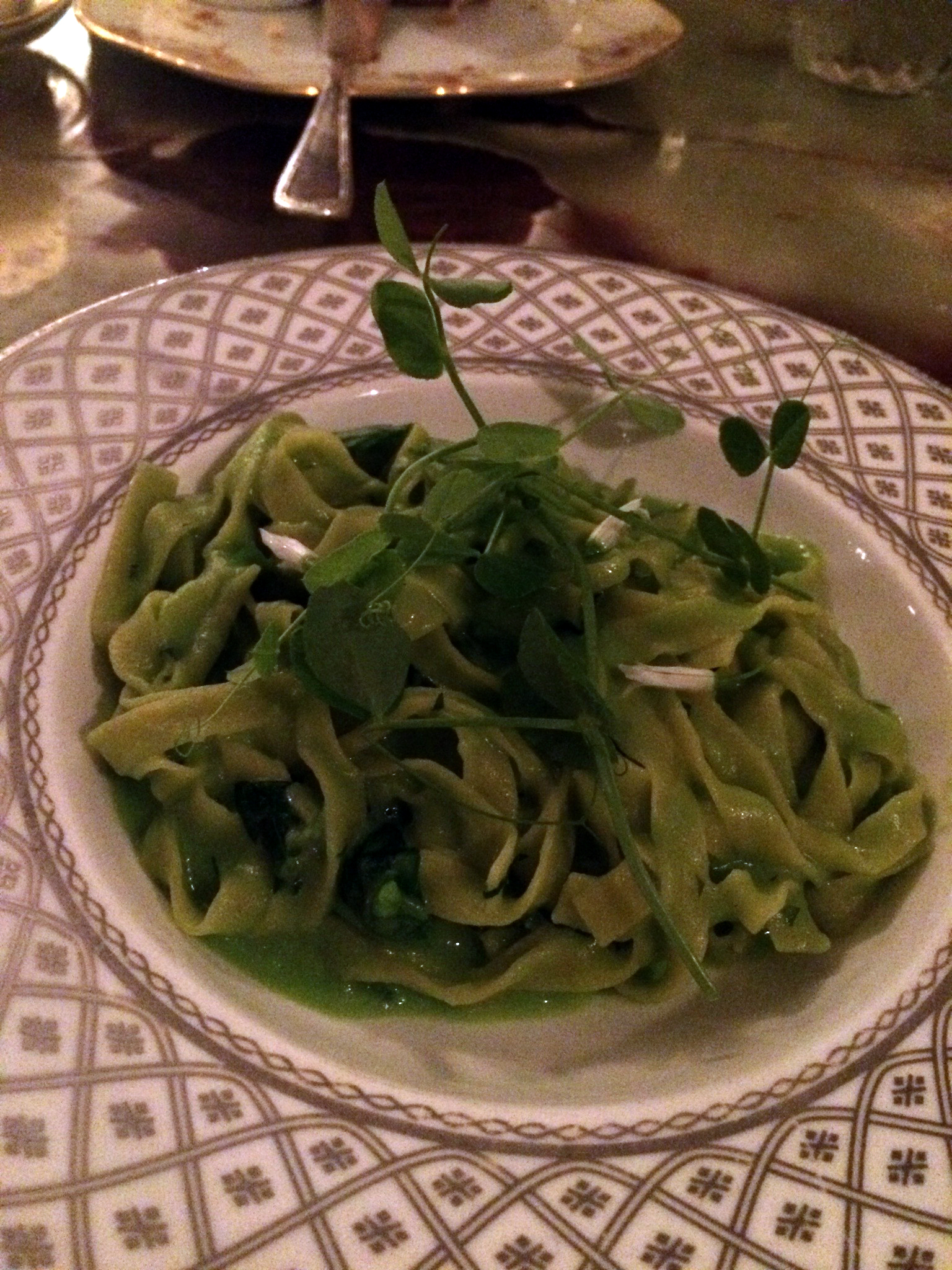 Fresh spring pea fettuccine with pea shoots.