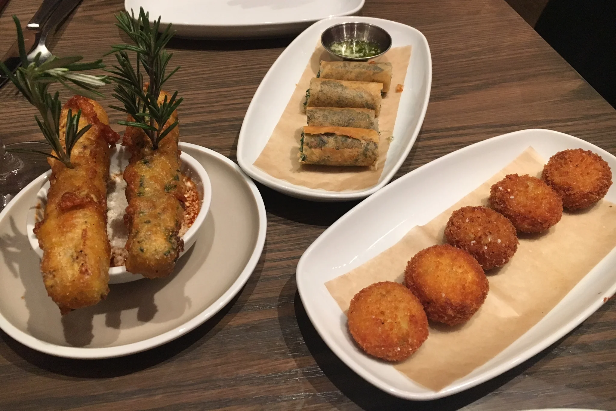 From left to right: Duck Egg Beignets, Snuggled Escargot, Tartiflette Fritters