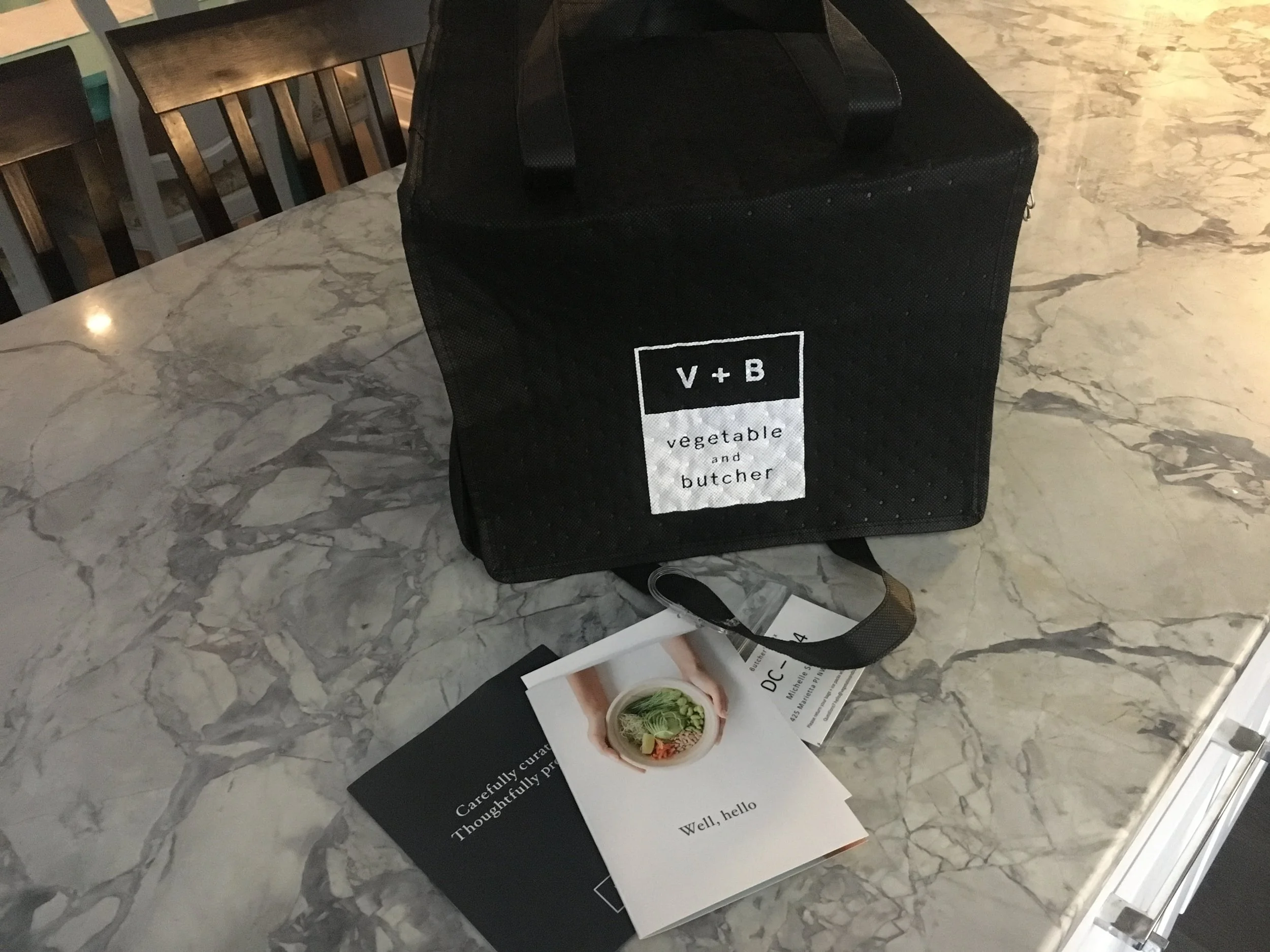 The meals come packaged in a reusable, insulated bag.