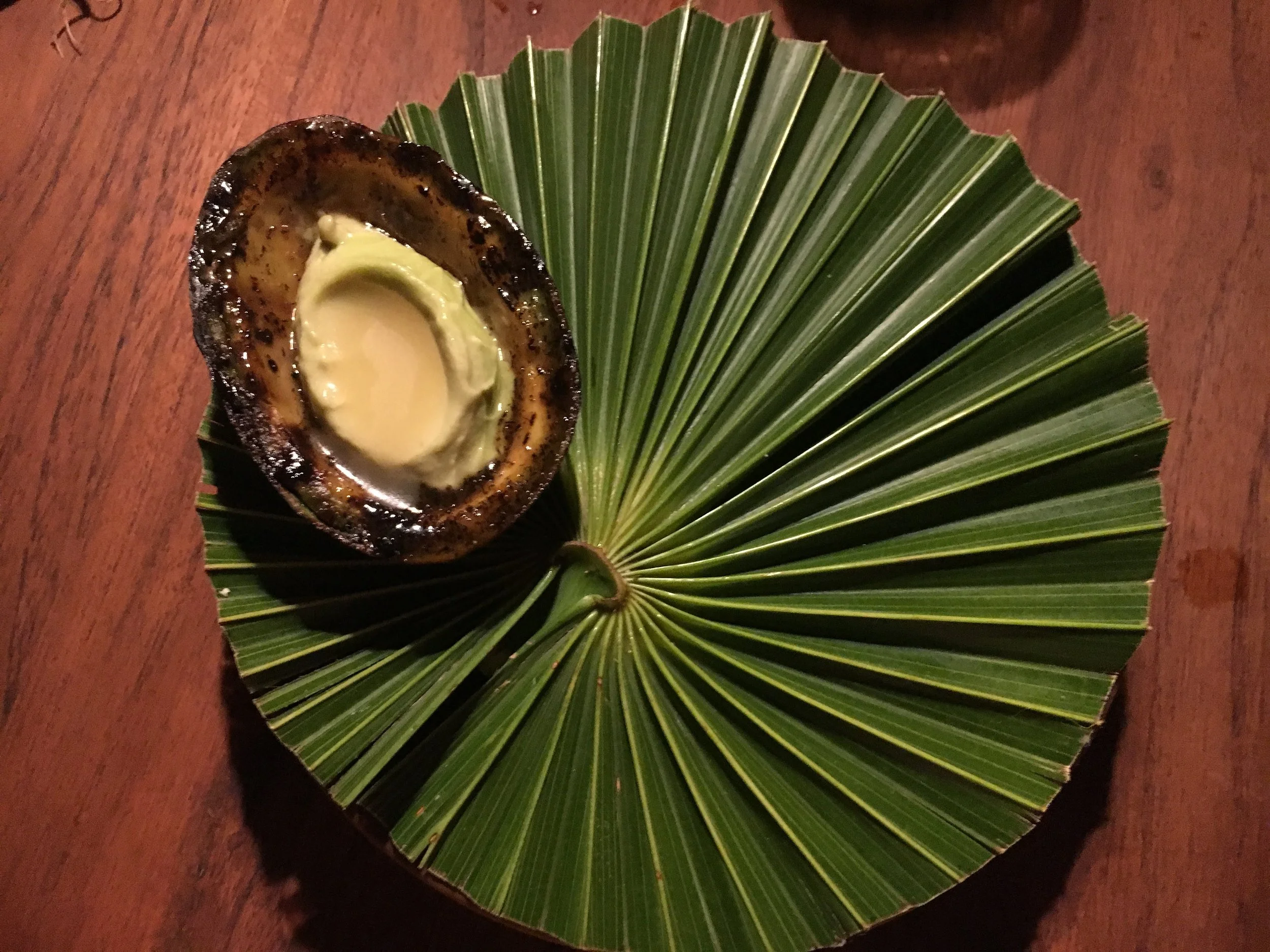 Avocado ice cream with ant egg glaze.