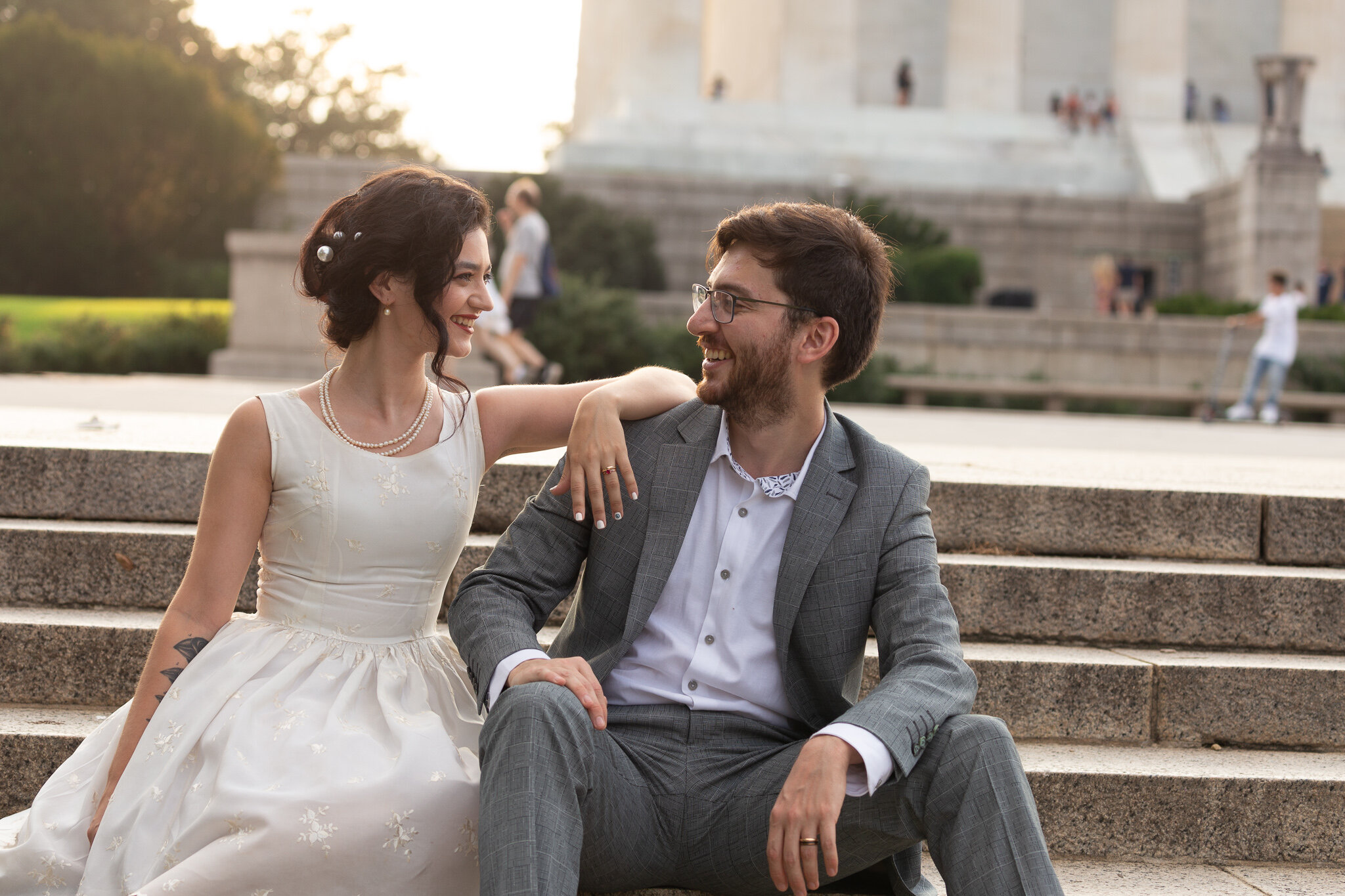 Bride and Groom sitting on steps
