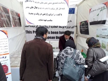 Visitors at the SPCD booth at AgFair