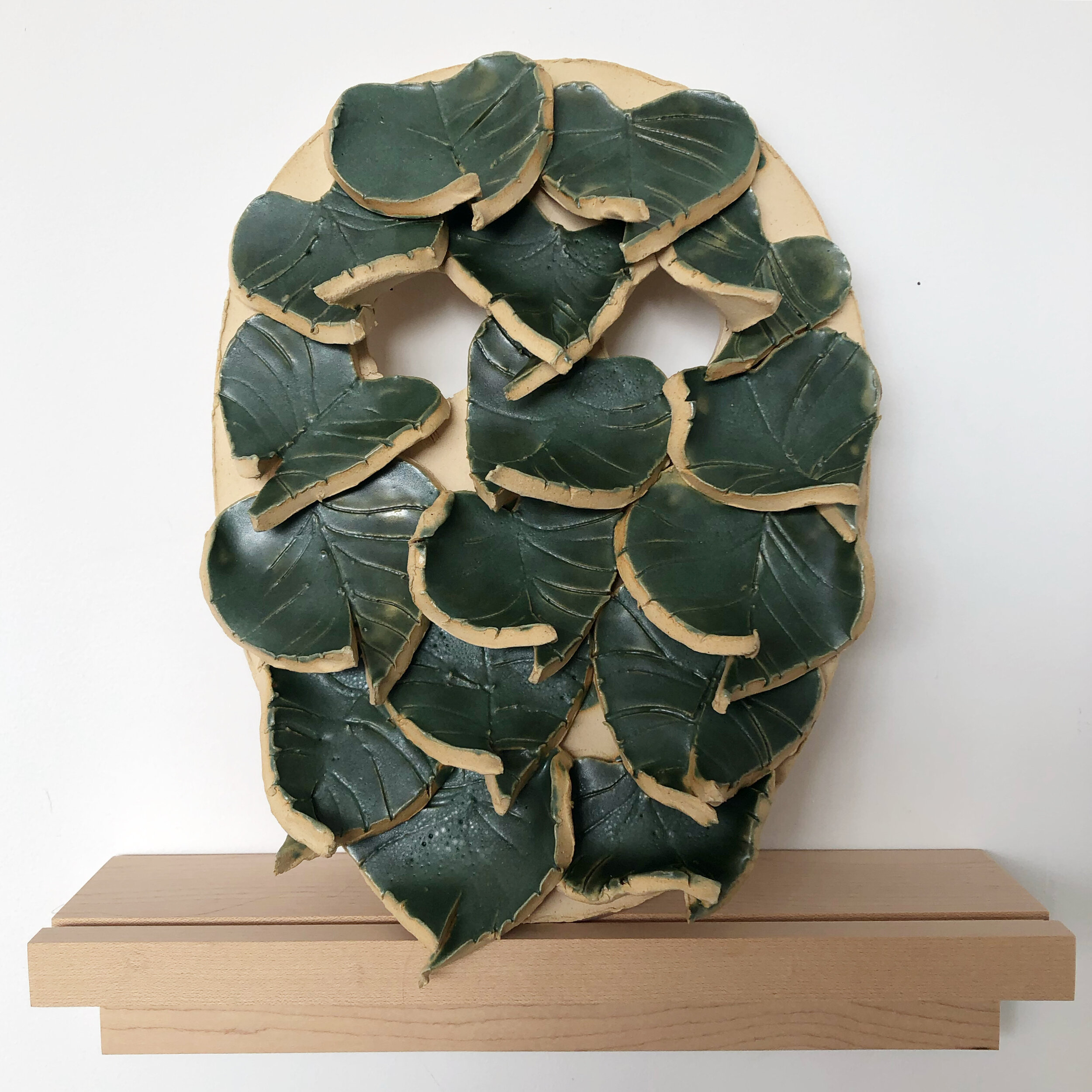 Mask with Leaves, 2020, glazed ceramic, 11 1/2 x 8 1/2 x 1 1/2"