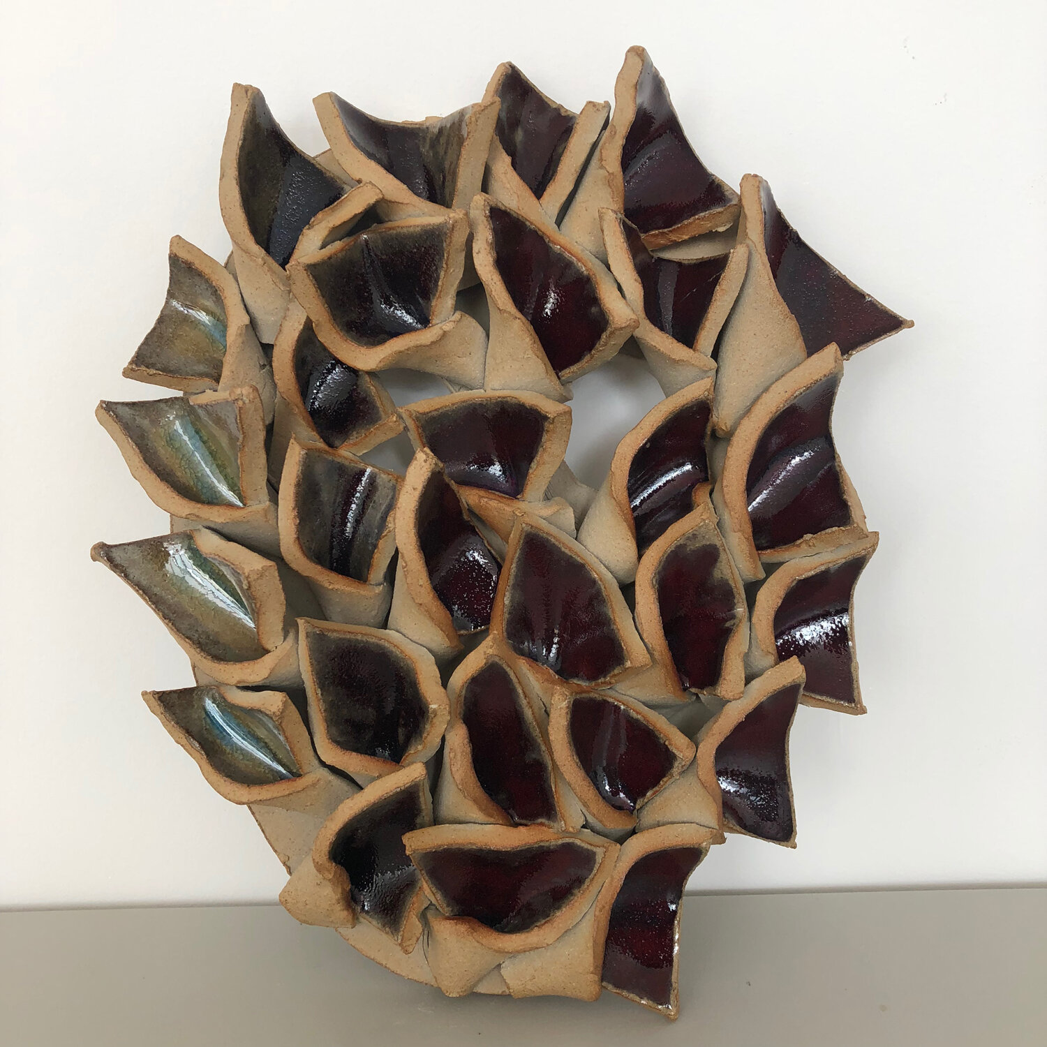 Mask, 2019, glazed ceramic, 13 x 11 1/2 x 2"