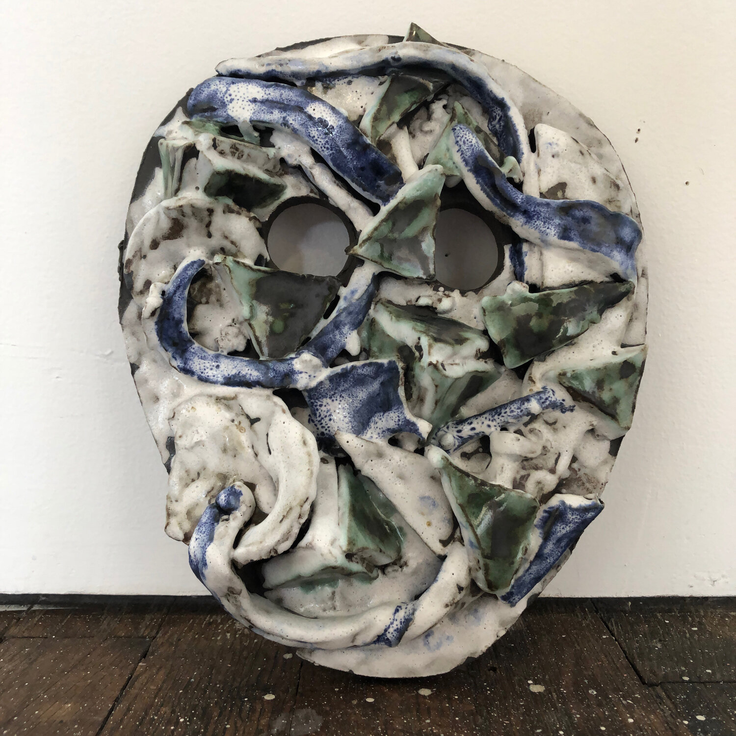 Mask with Pyramid Trash, 2020, glazed ceramic, 8 3/4 x 7 1/4 x 1 3/4"