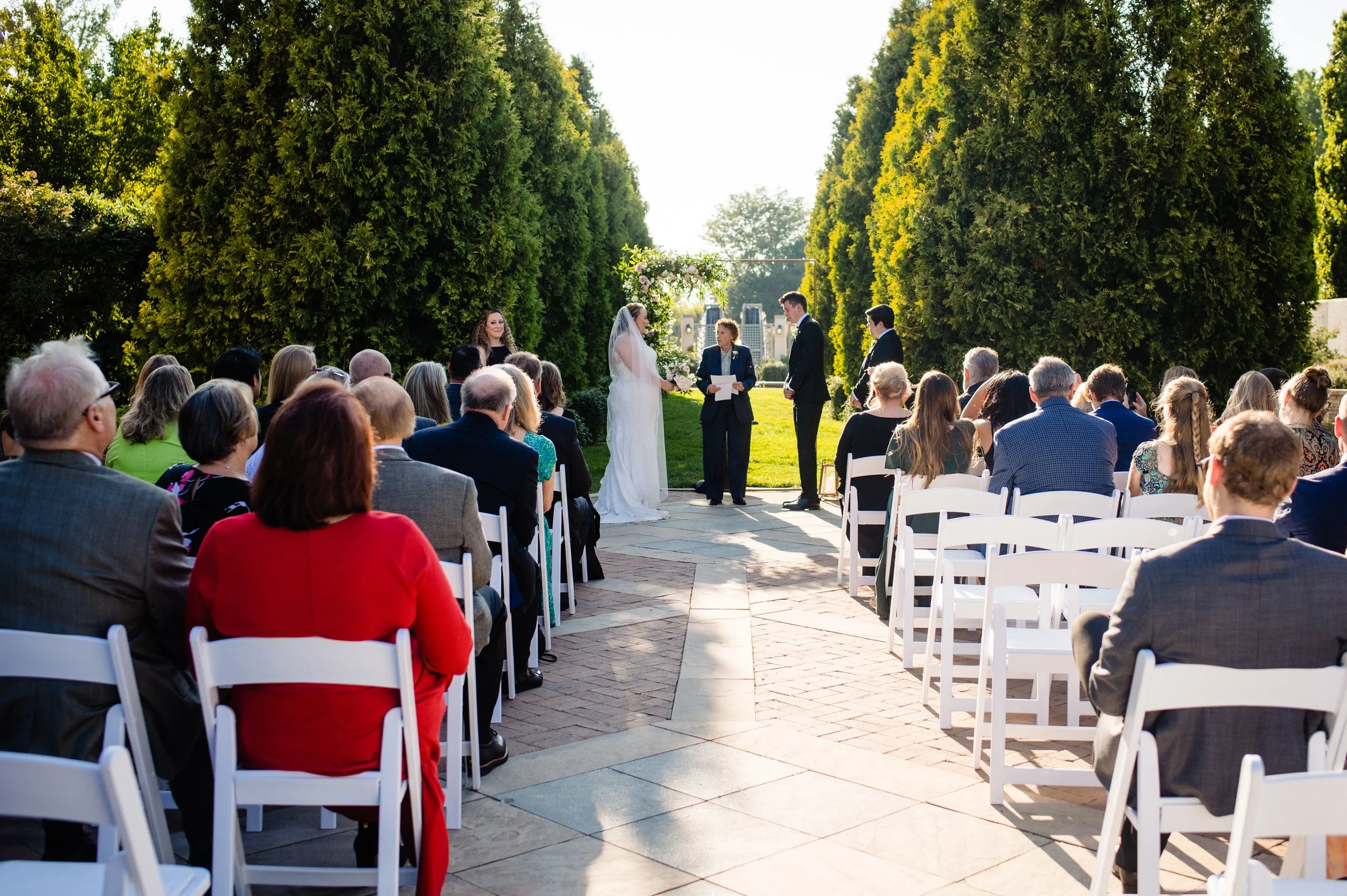Outdoor wedding ceremony in the Romantic Gardens at Denver Botanic Gardens